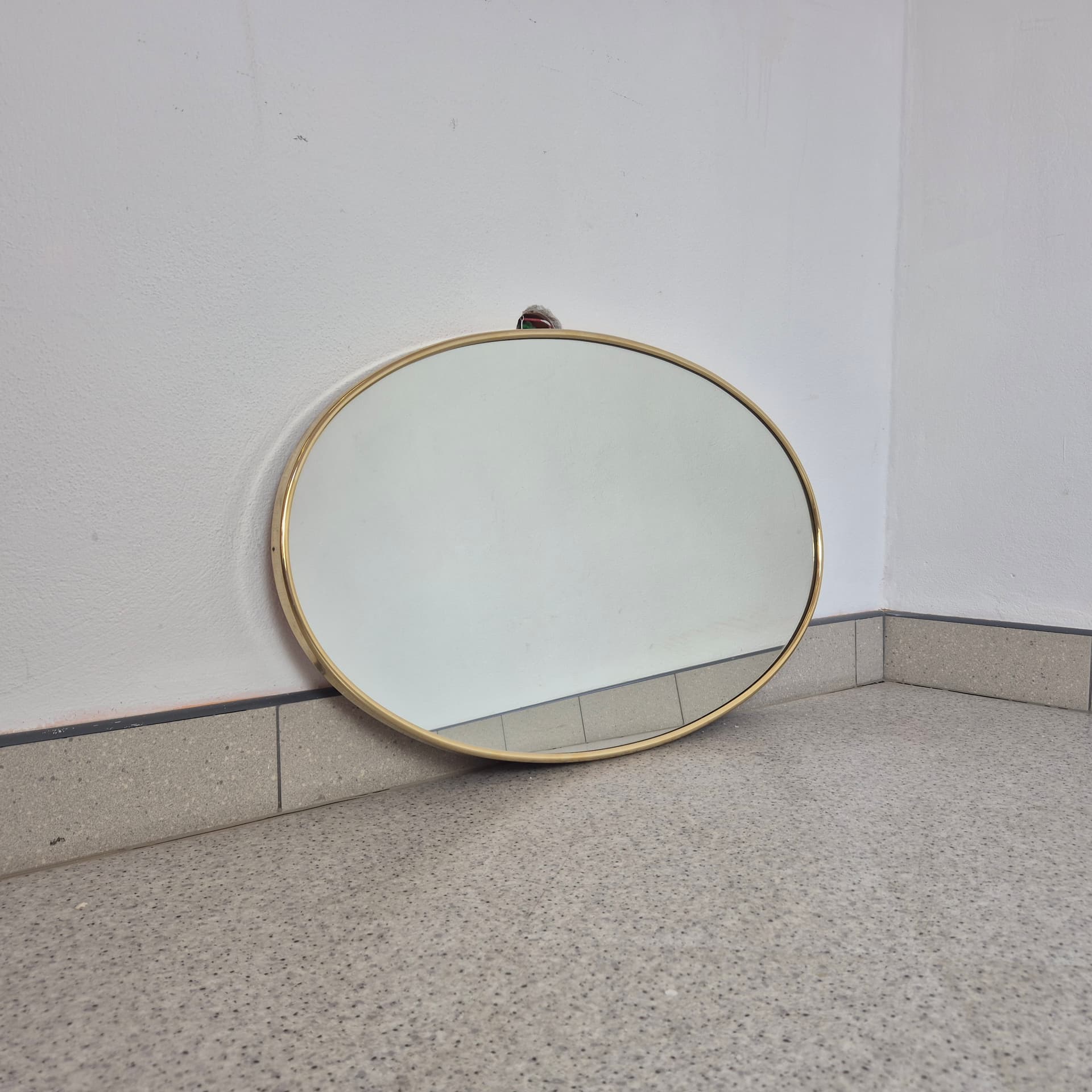Oval mirror, gold metal, glass, Germany, 1960s. - 324282