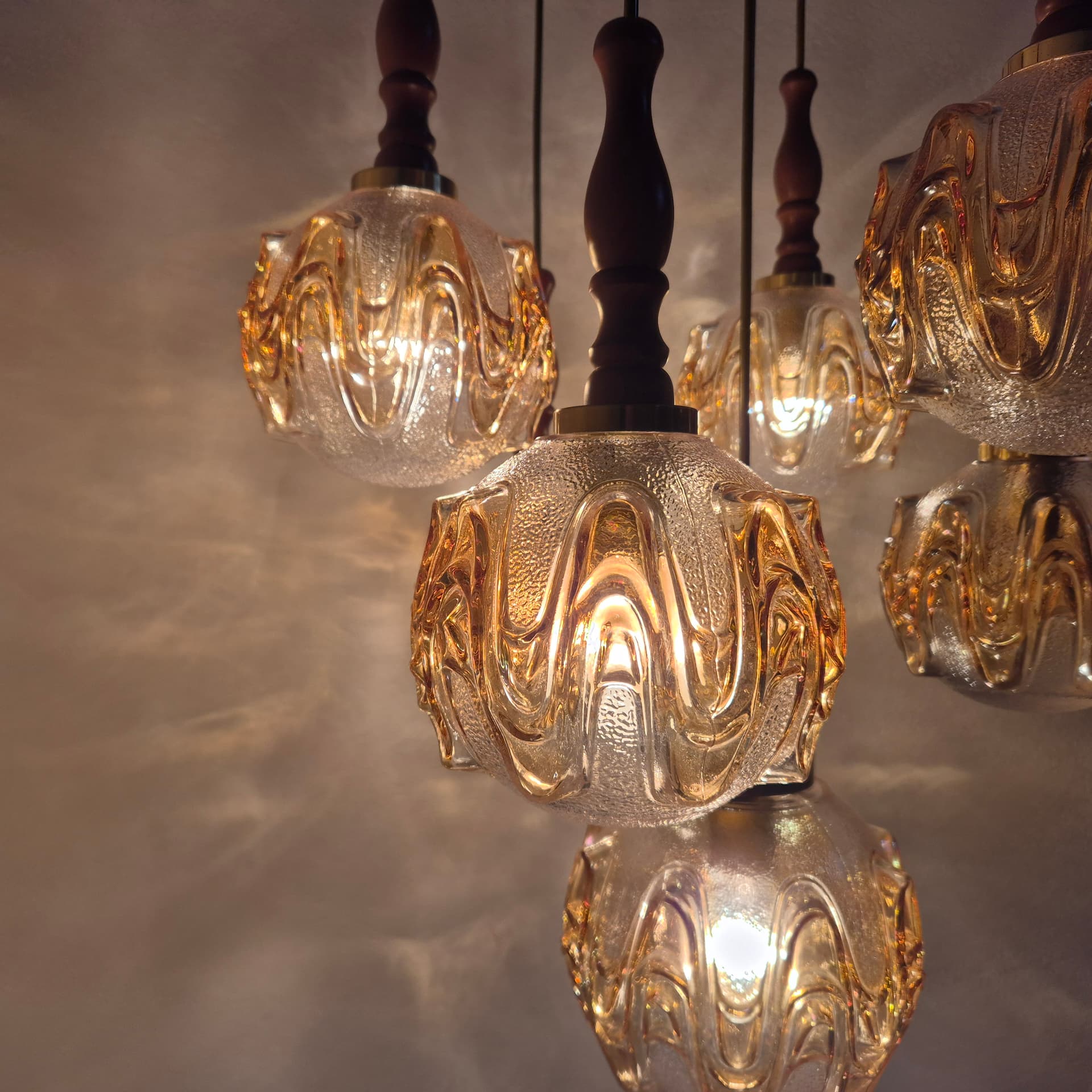 Cascading pendant lamp, honey glass, walnut, brass, Germany, 1960s. - 324952