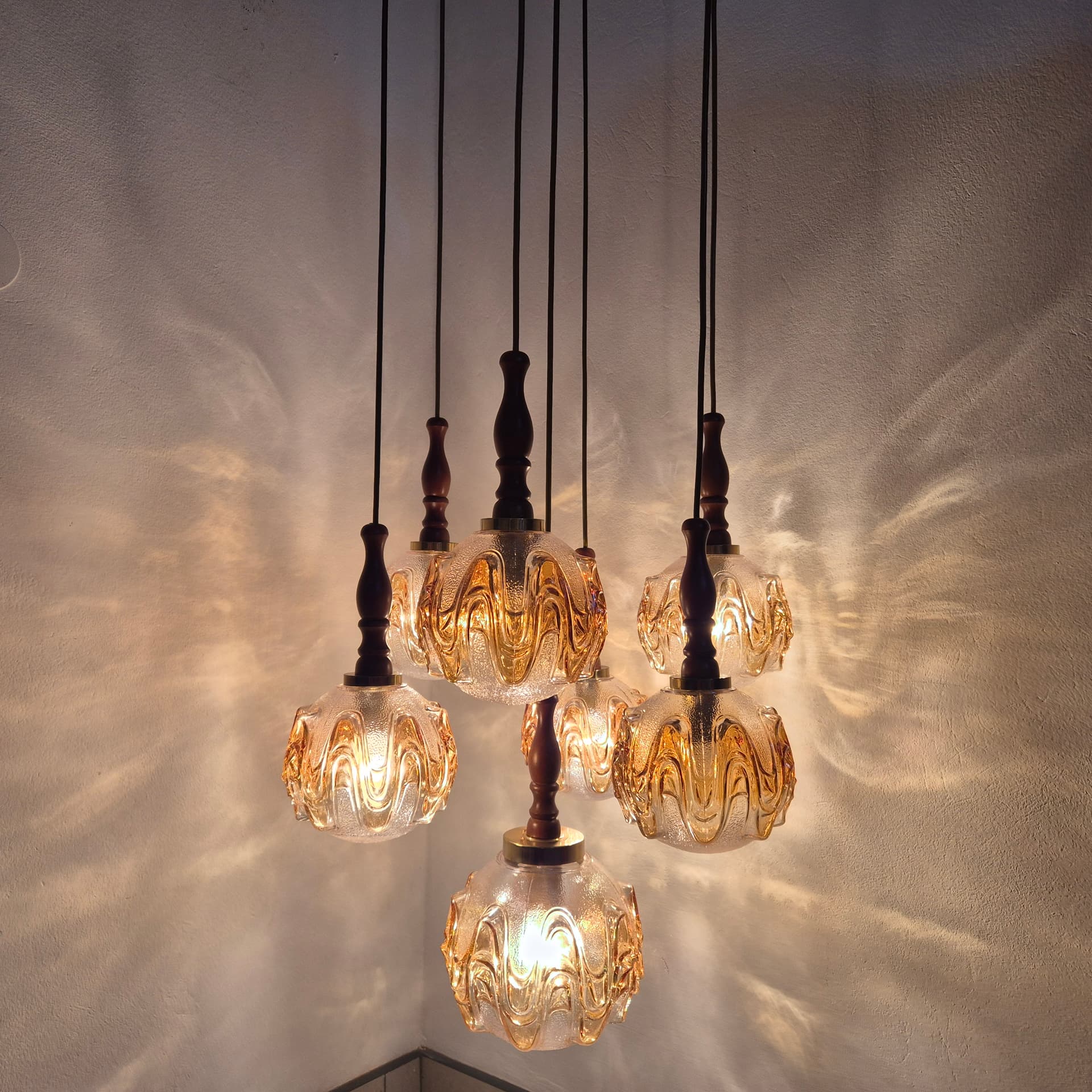 Cascading pendant lamp, honey glass, walnut, brass, Germany, 1960s. - 324954