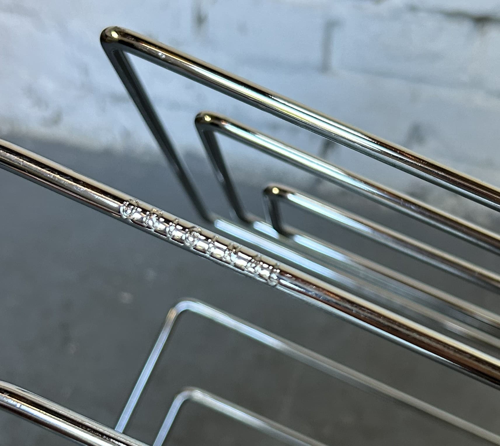 Magazine Rack TMP, silver chrome, by W. Glaeser, Thomas Merlo & Partner, 1980s. - 325120