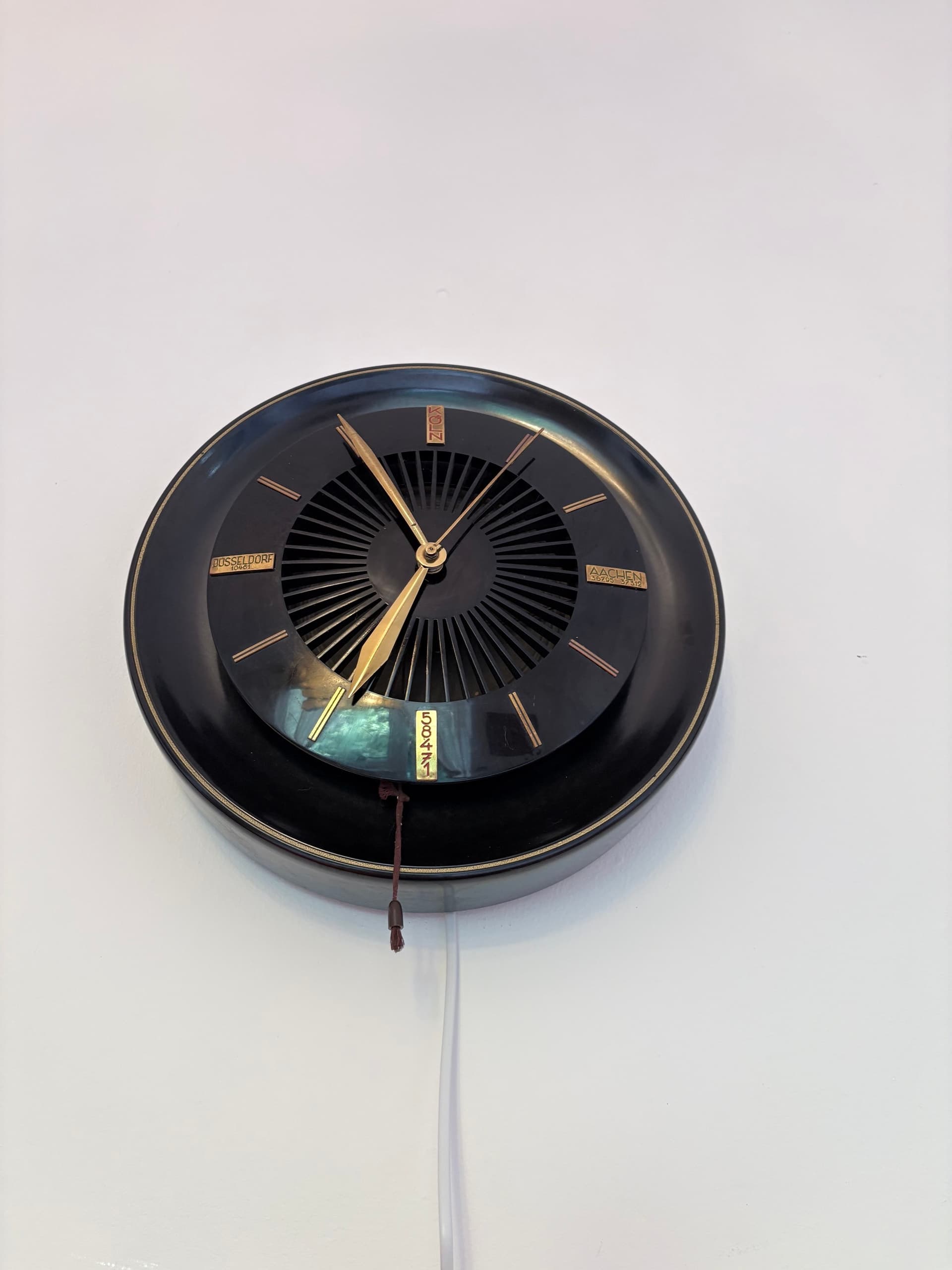 Wall Clock Speaker Heco WLU-30, black bakelite, gold brass, Germany, 1950s. - 326784