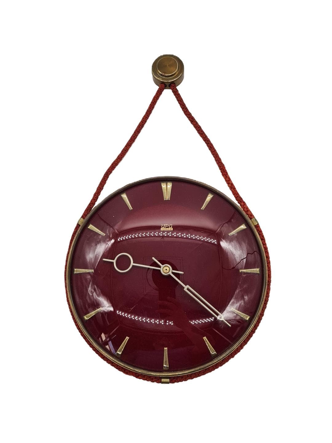 Wall Clock, Space Age, red acrylic, gold metal, East Germany, 1970s.