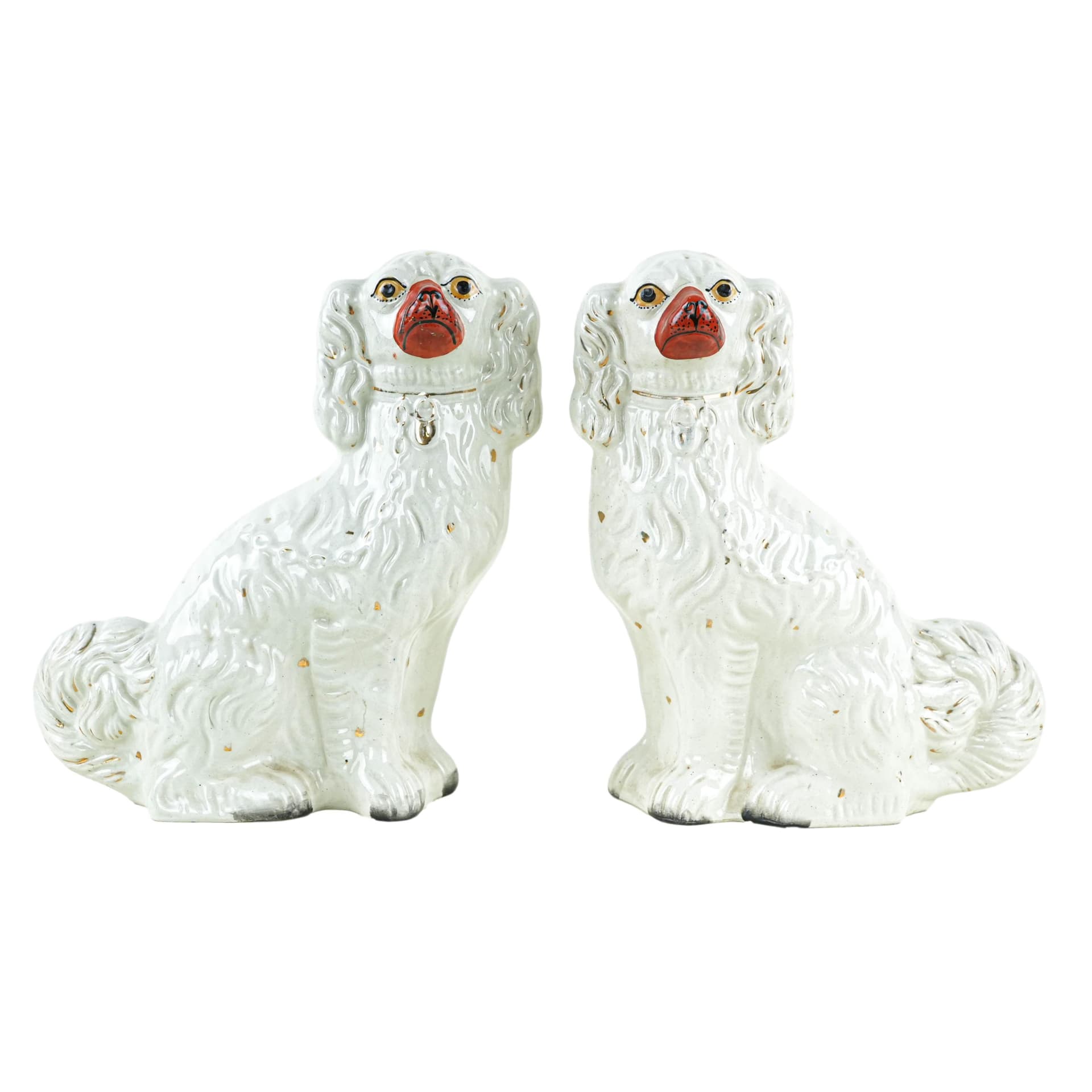 Pair of Staffordshire figurines, white red gold ceramic, United Kingdom, 19th c.