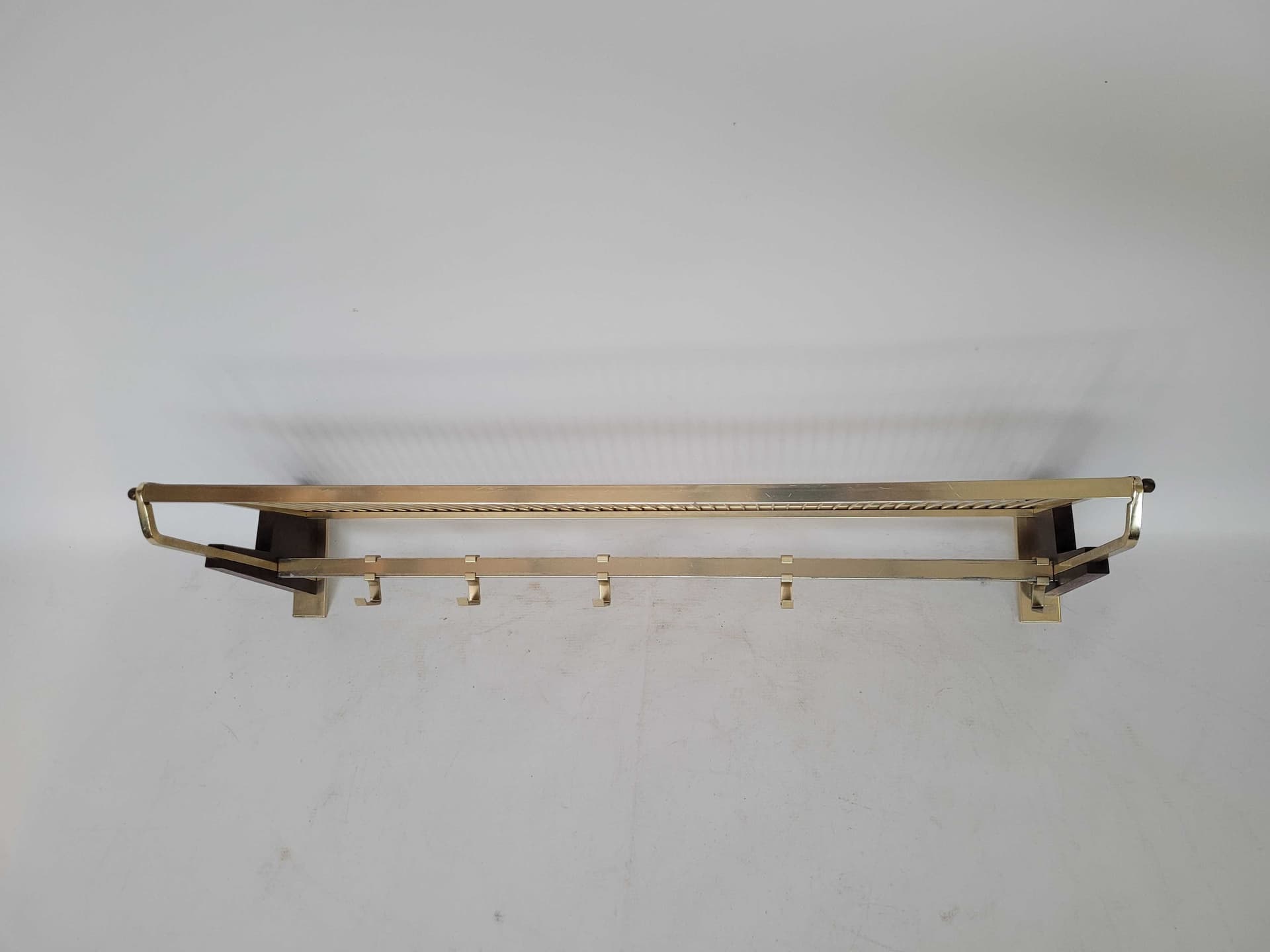 Wall-mounted coat rack, gold, aluminum brass, Poland, 1960s. - 328109