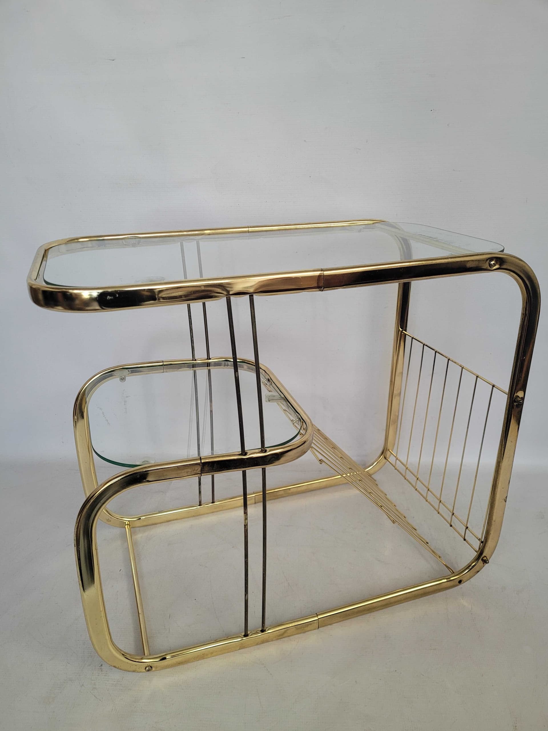 Side Table Magazine Rack Hollywood Regency, gold brass, transparent glass, 1980s. - 328429