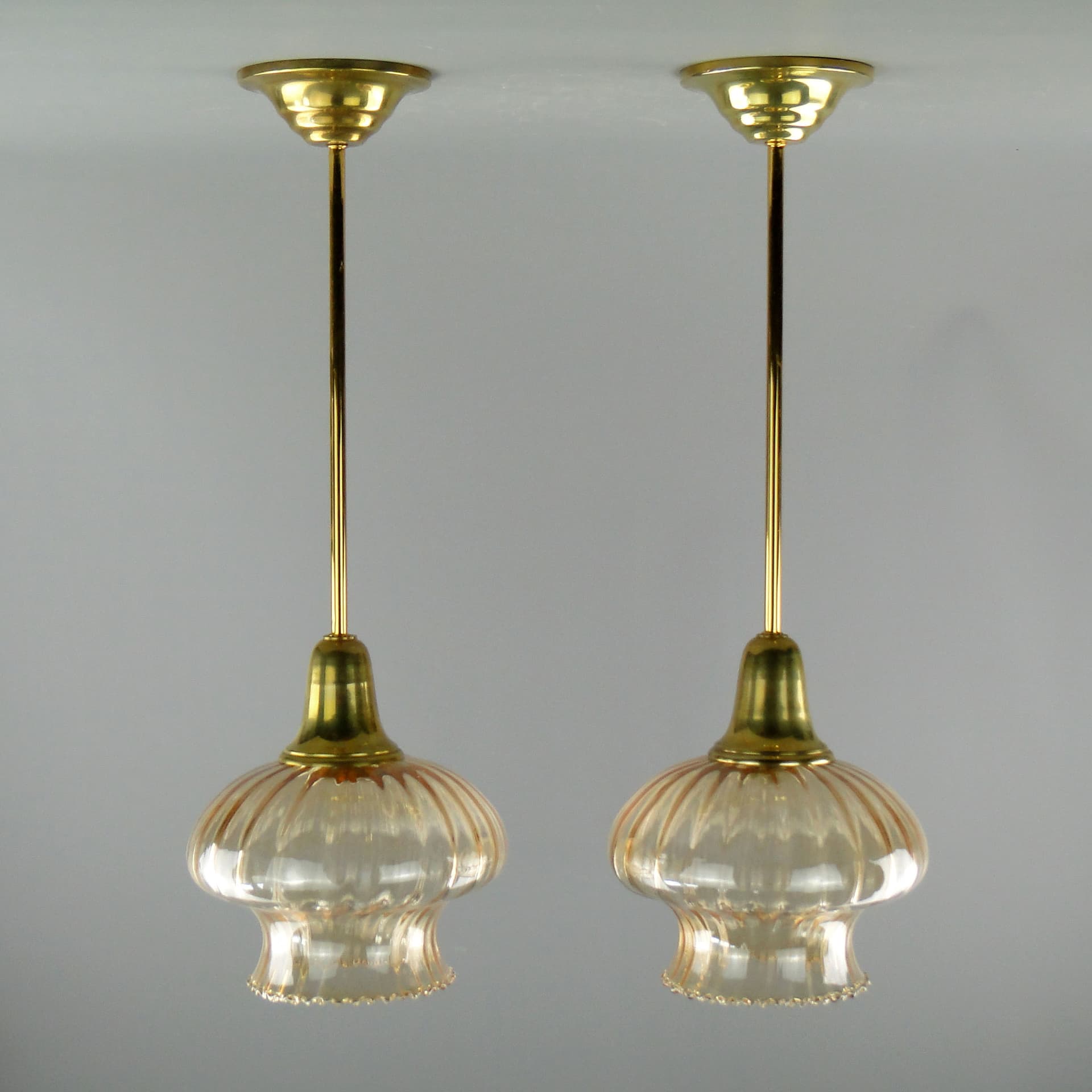 Pair of pendant lamps, golden, glass, Poland, 1960s. - 2651