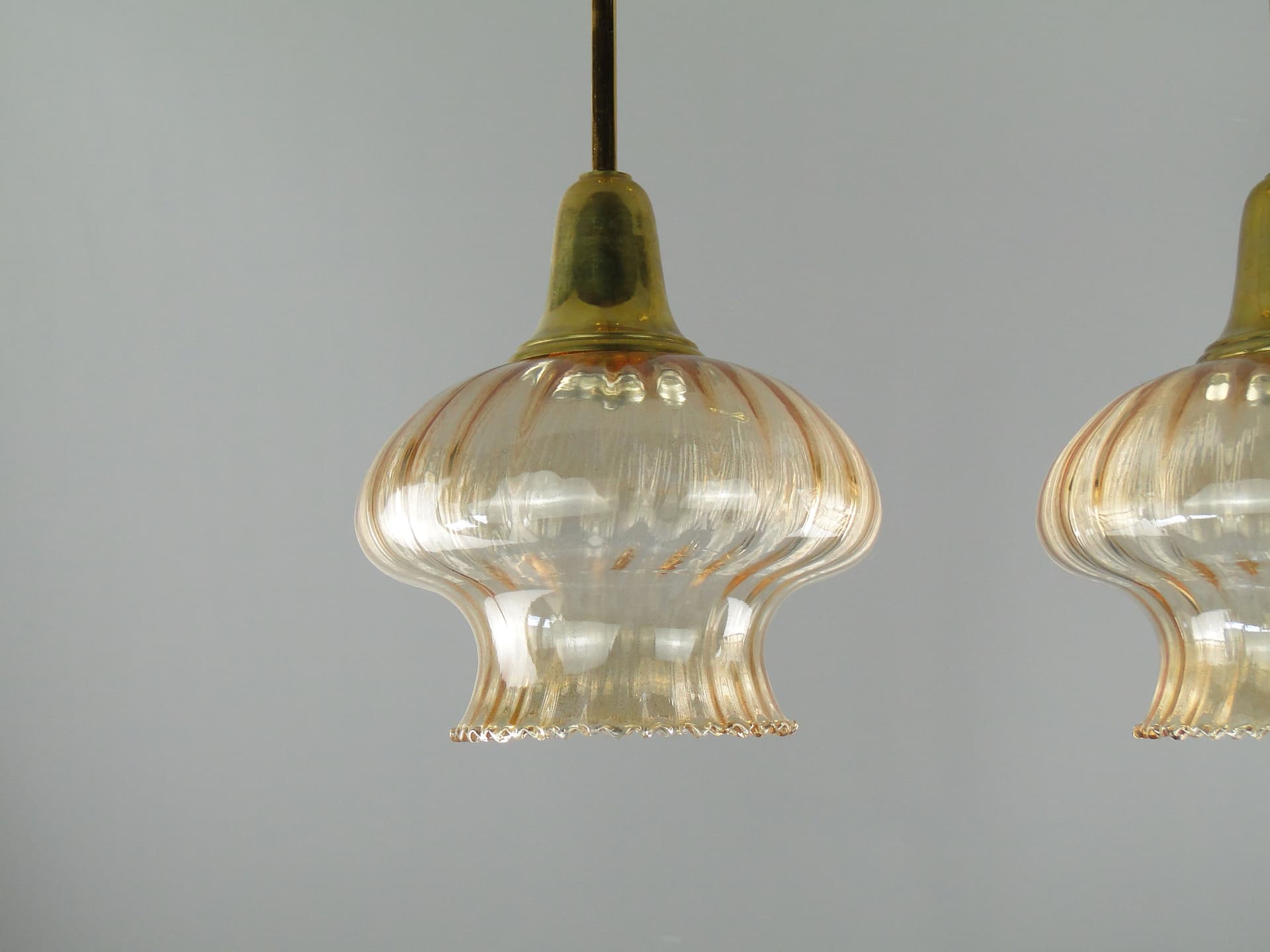 Pair of pendant lamps, golden, glass, Poland, 1960s. - 2654