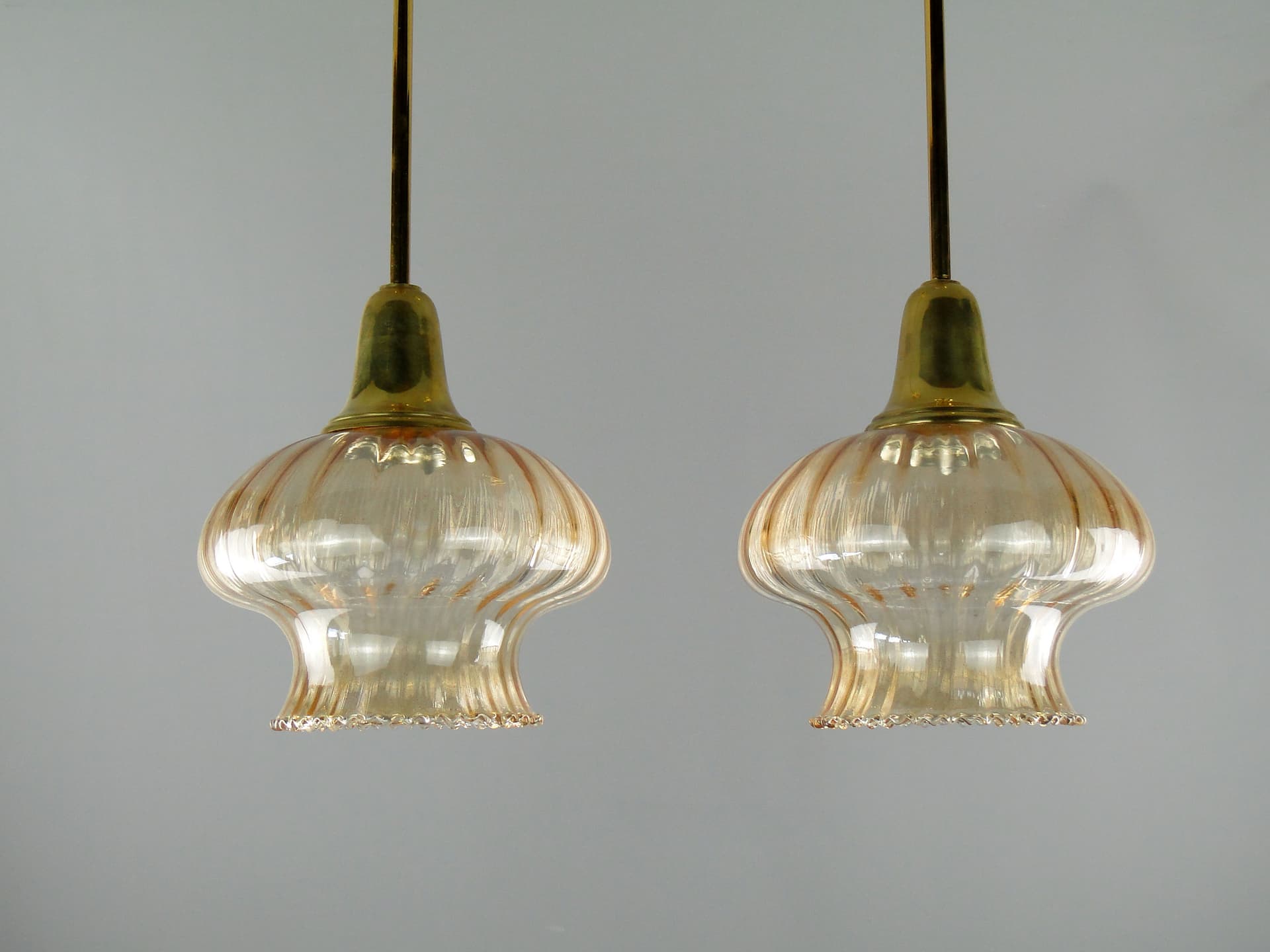 Pair of pendant lamps, golden, glass, Poland, 1960s. - 2653