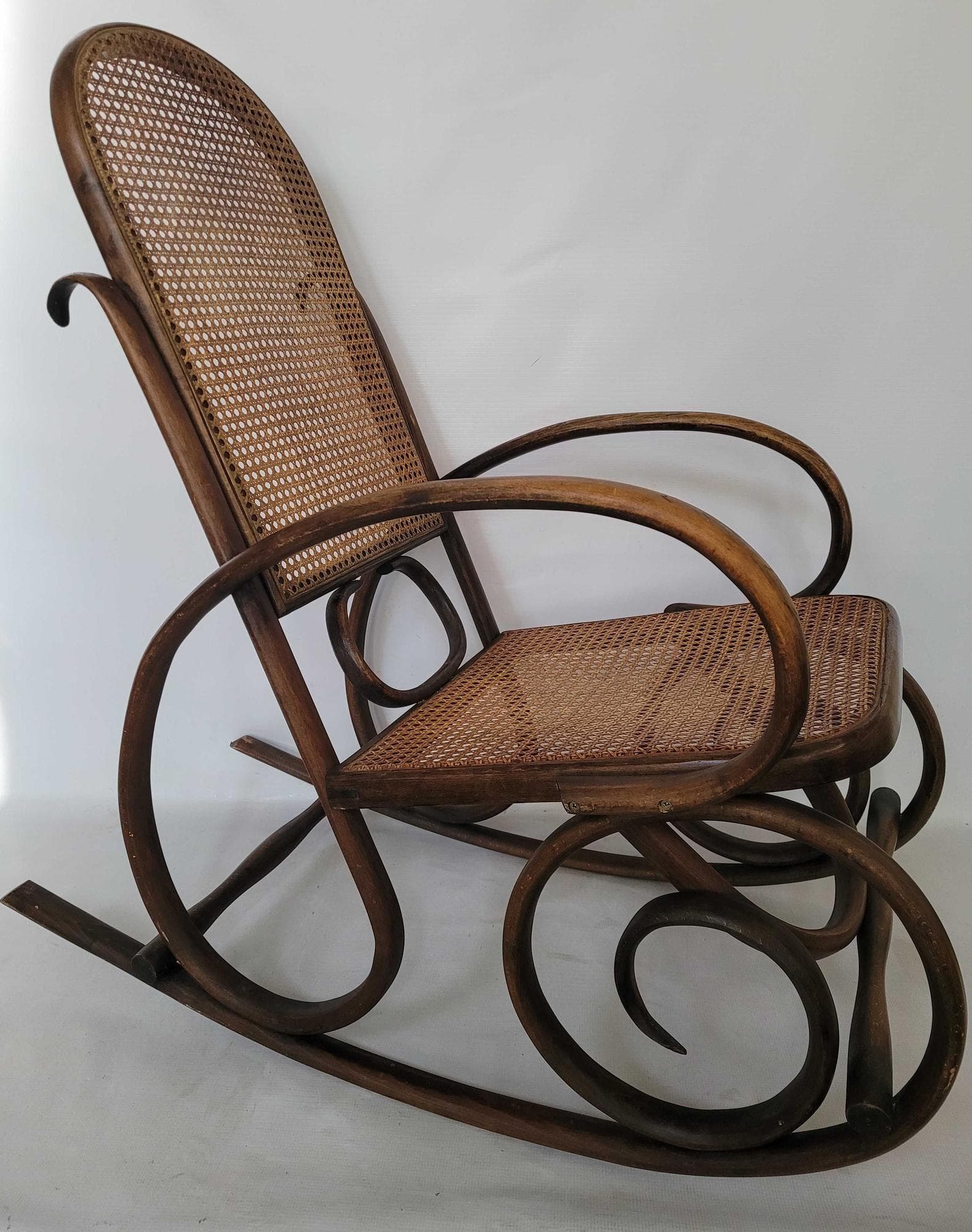 Rocking chair, brown wood, beige rattan, Austria, 1930s. - 328696