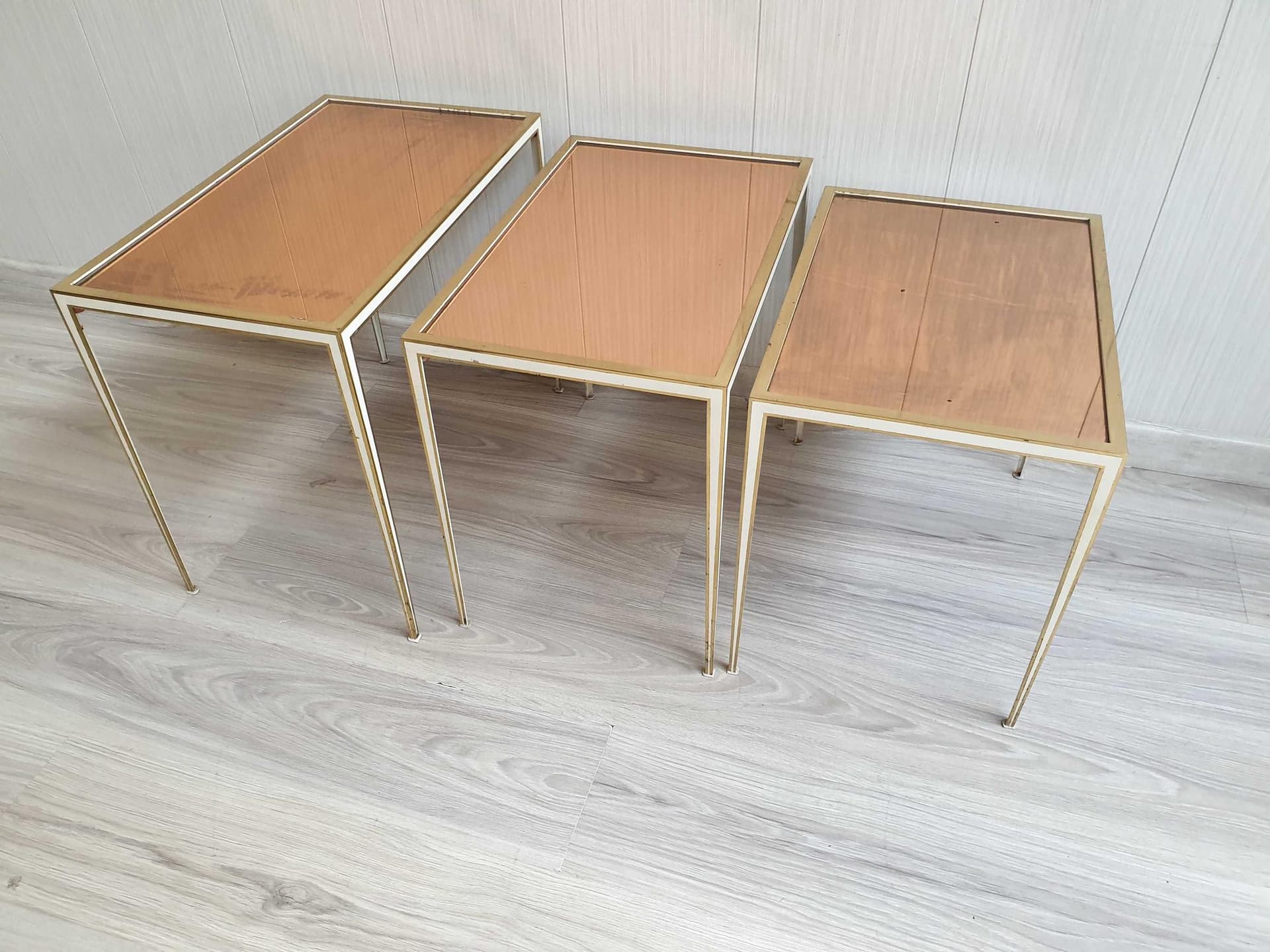Set of three side tables, gold brass, brown glass, Vereinigte Werkstätten, Germany, 1960s. - 331899