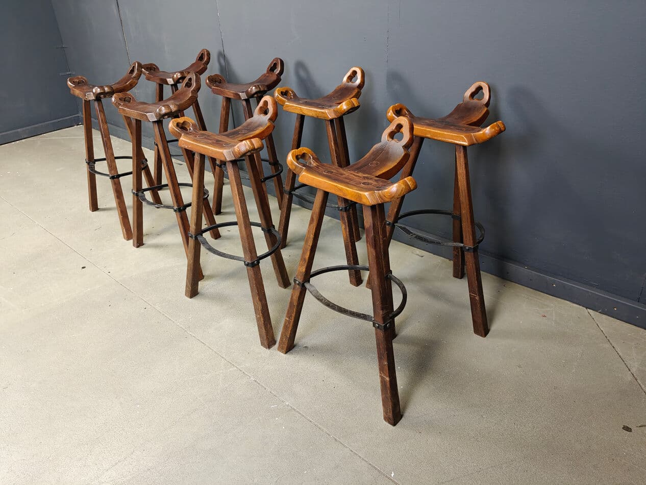 Set of eight brutalist bar stools, brown wood, black metal, Spain, 1960s. - 331315