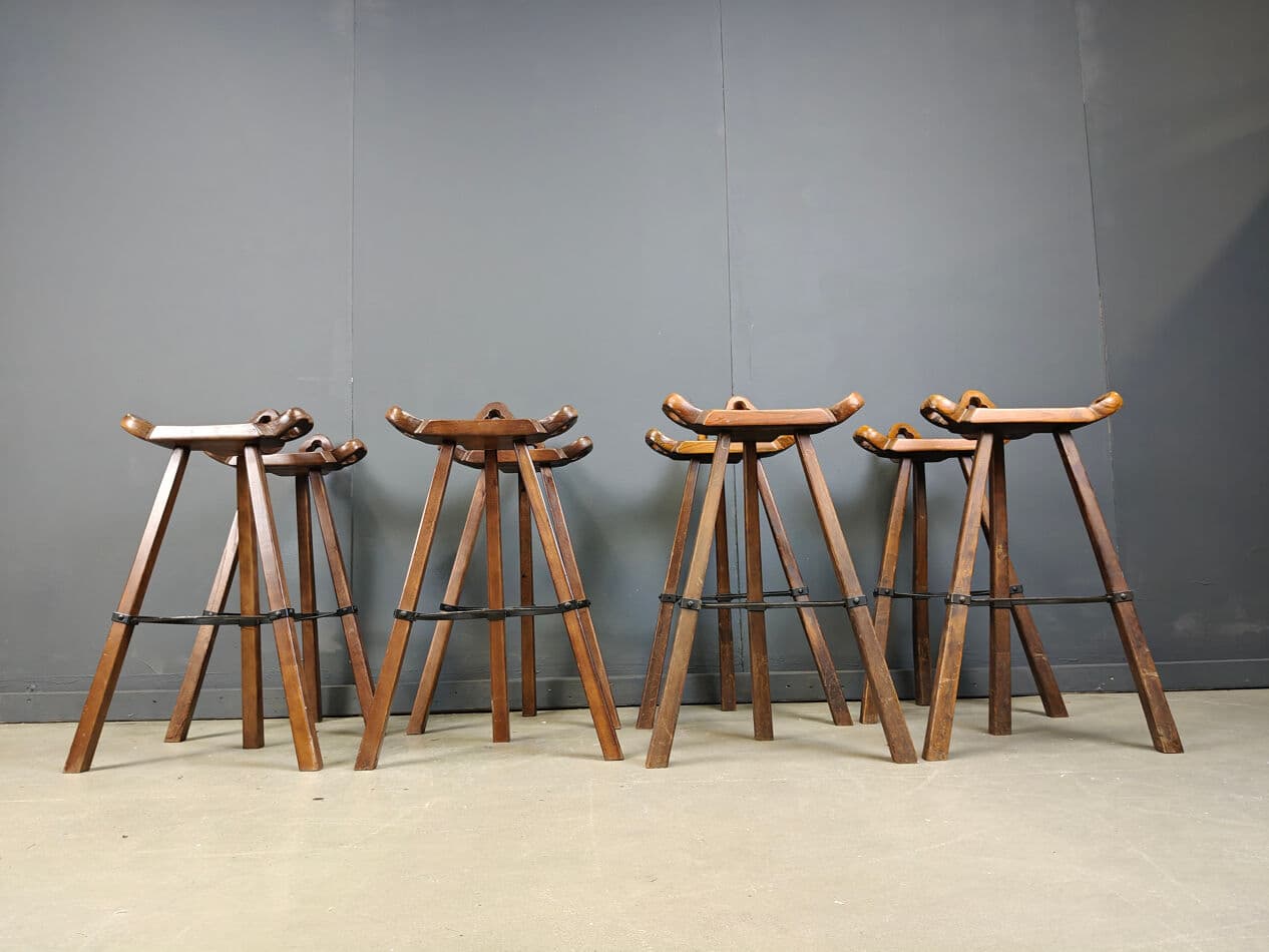 Set of eight brutalist bar stools, brown wood, black metal, Spain, 1960s. - 331312