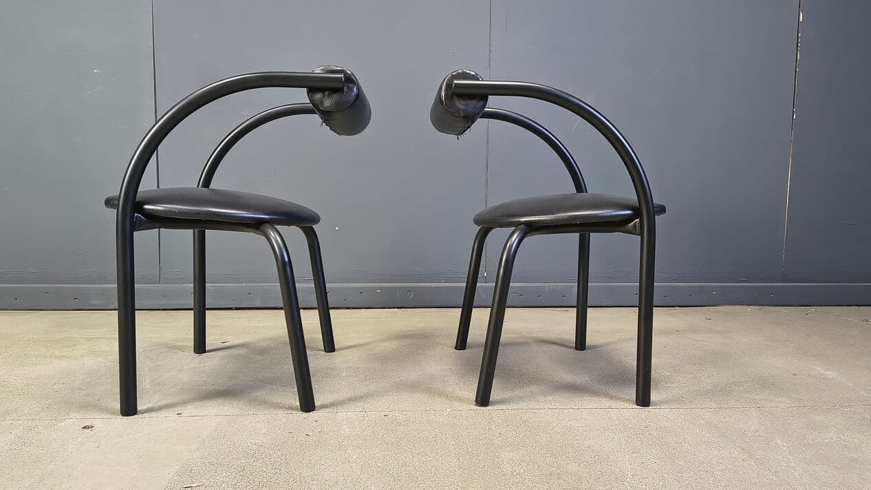Set of four postmodern dining chairs, black metal, black leatherette, Italy, 1980s. - 331024