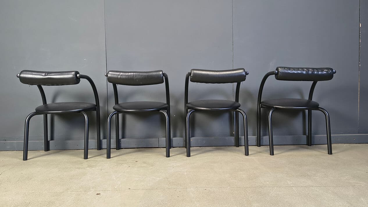 Set of four postmodern dining chairs, black metal, black leatherette, Italy, 1980s. - 331022