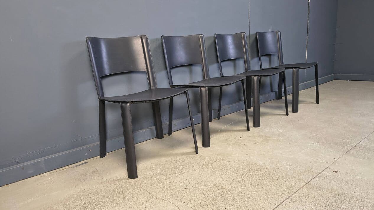Set of four dining chairs, black leather, Italy, 1980s. - 330960
