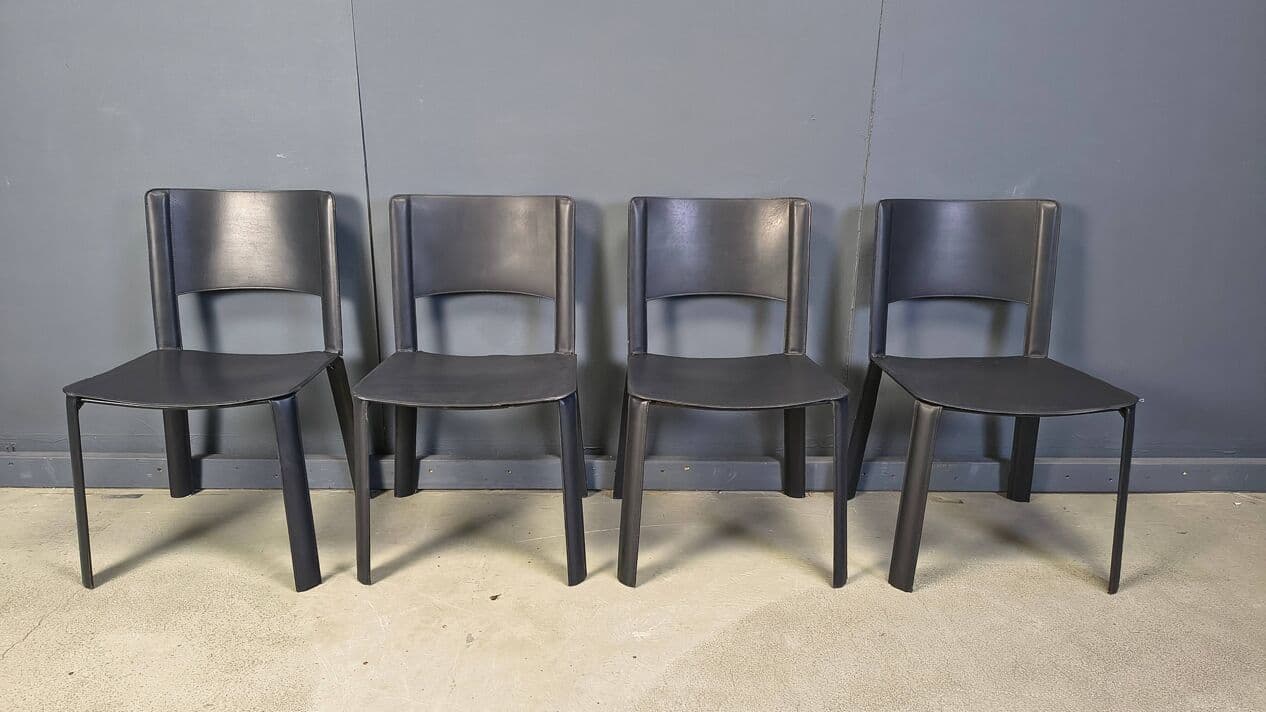 Set of four dining chairs, black leather, Italy, 1980s. - 330958