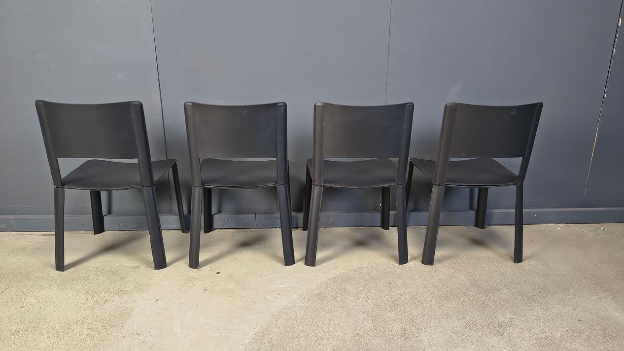 Set of four dining chairs, black leather, Italy, 1980s. - 330965