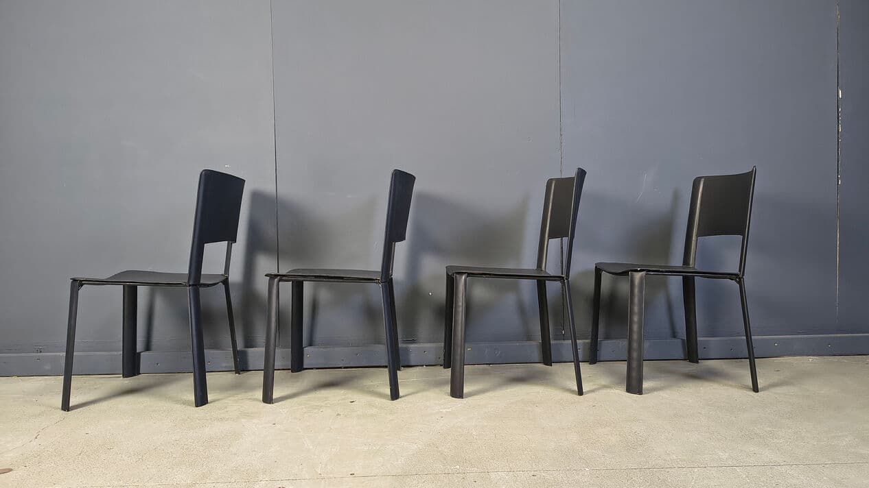 Set of four dining chairs, black leather, Italy, 1980s. - 330963