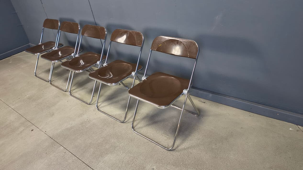 Set of five folding chairs Plia, transparent brown plastic, chrome, by G. Piretti, Castelli, Italy, 1970s. - 330914
