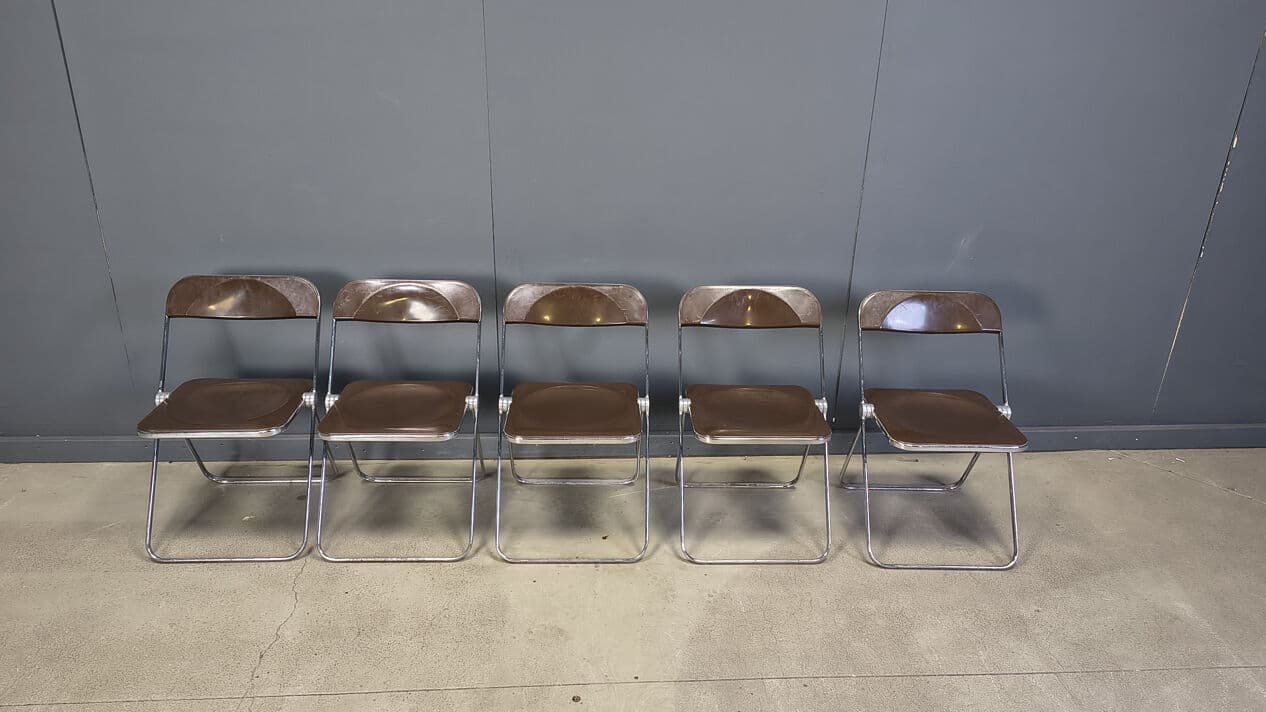 Set of five folding chairs Plia, transparent brown plastic, chrome, by G. Piretti, Castelli, Italy, 1970s. - 330911