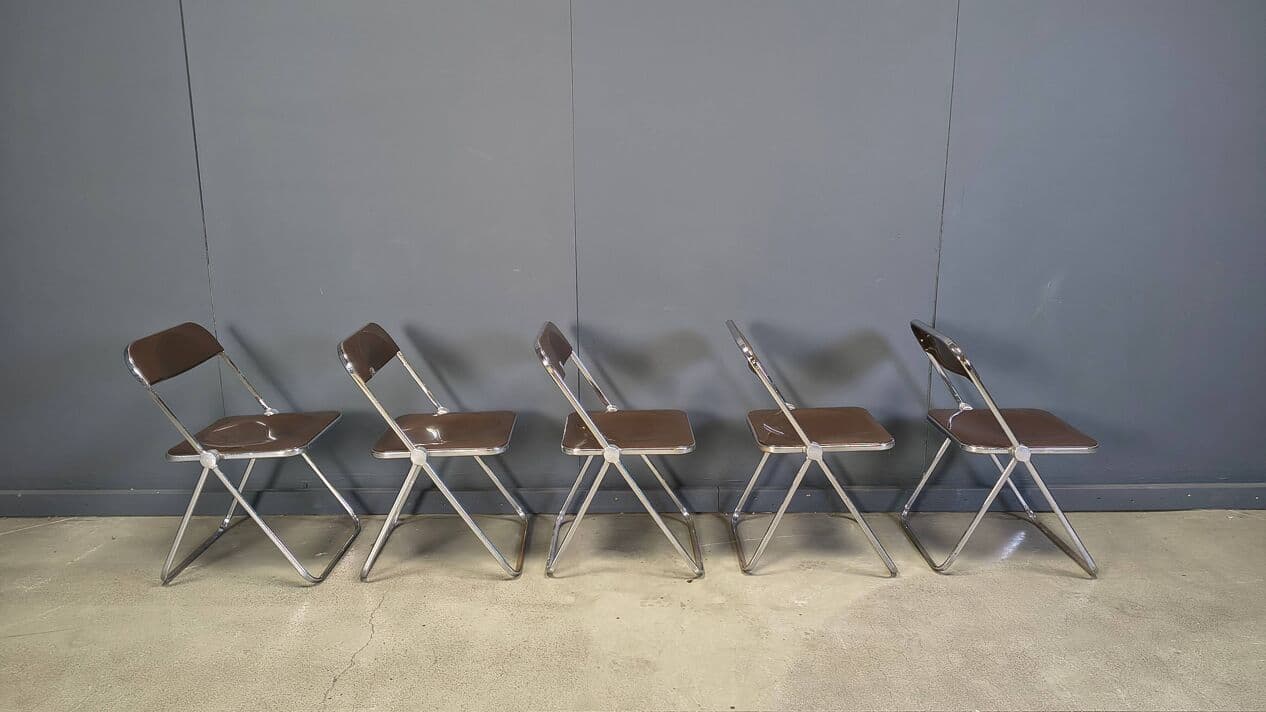 Set of five folding chairs Plia, transparent brown plastic, chrome, by G. Piretti, Castelli, Italy, 1970s. - 330913