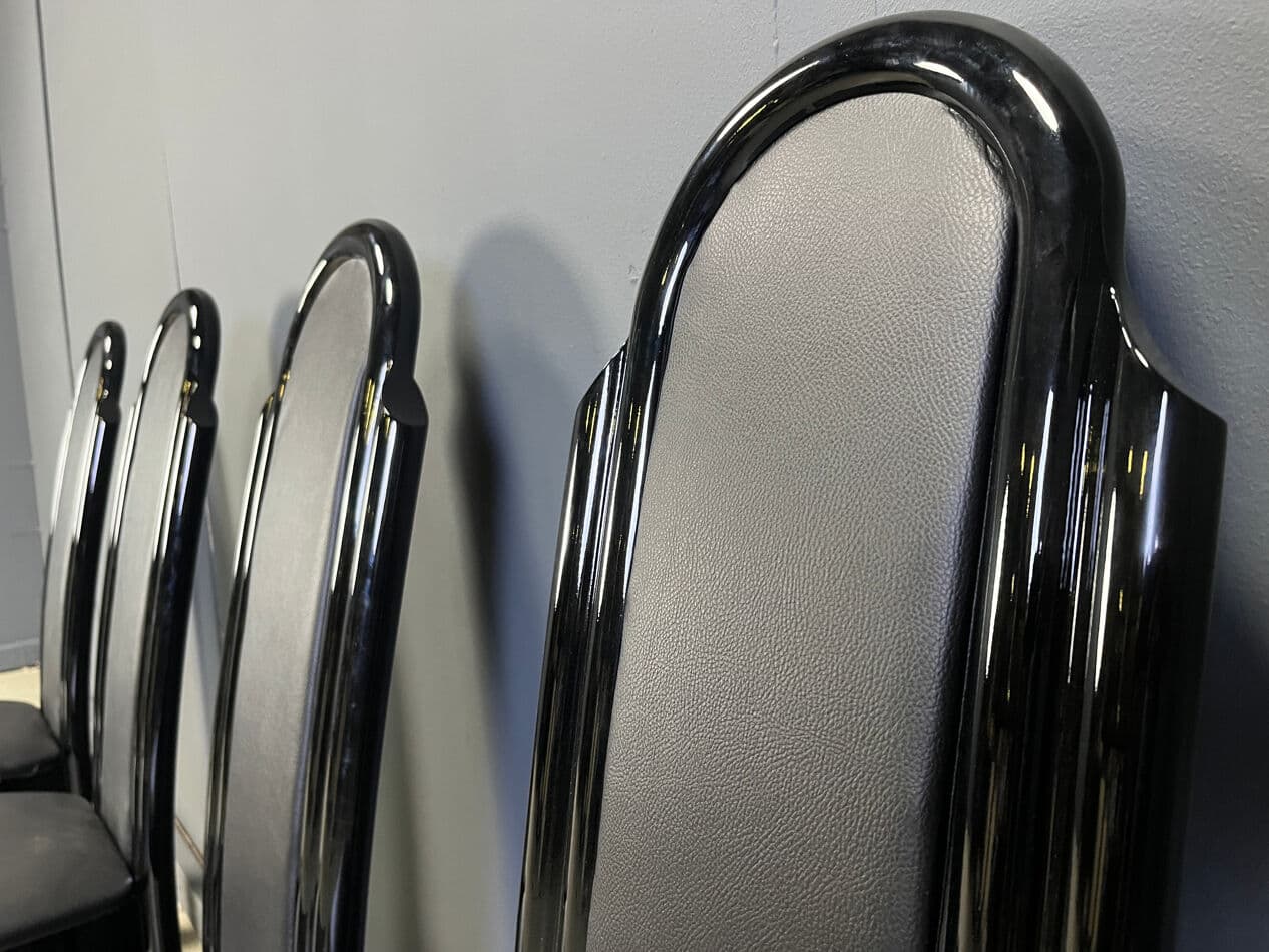 Set of four postmodern dining chairs, black wood, black faux leather, Italy, 1980s. - 330340