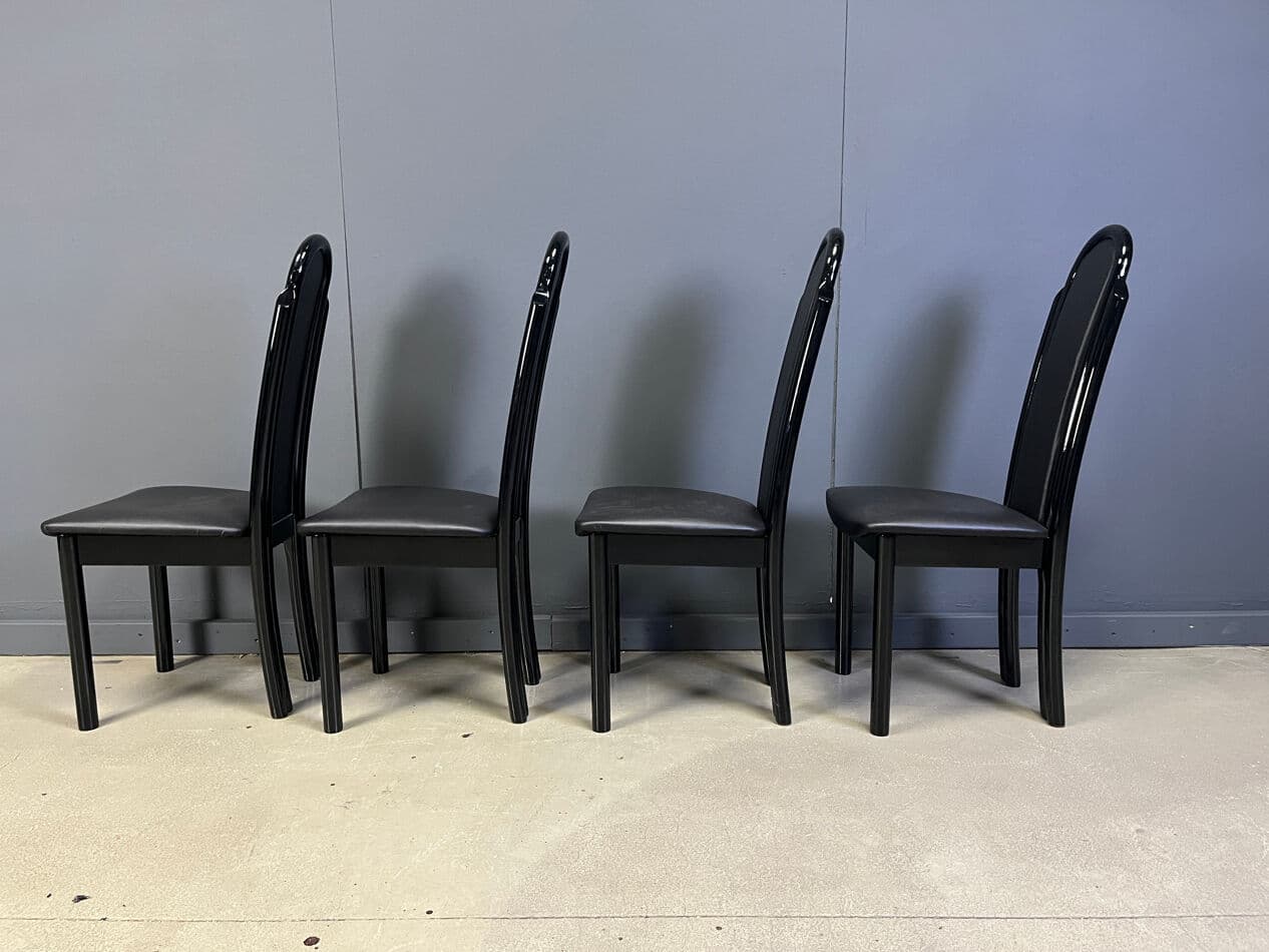Set of four postmodern dining chairs, black wood, black faux leather, Italy, 1980s. - 330342
