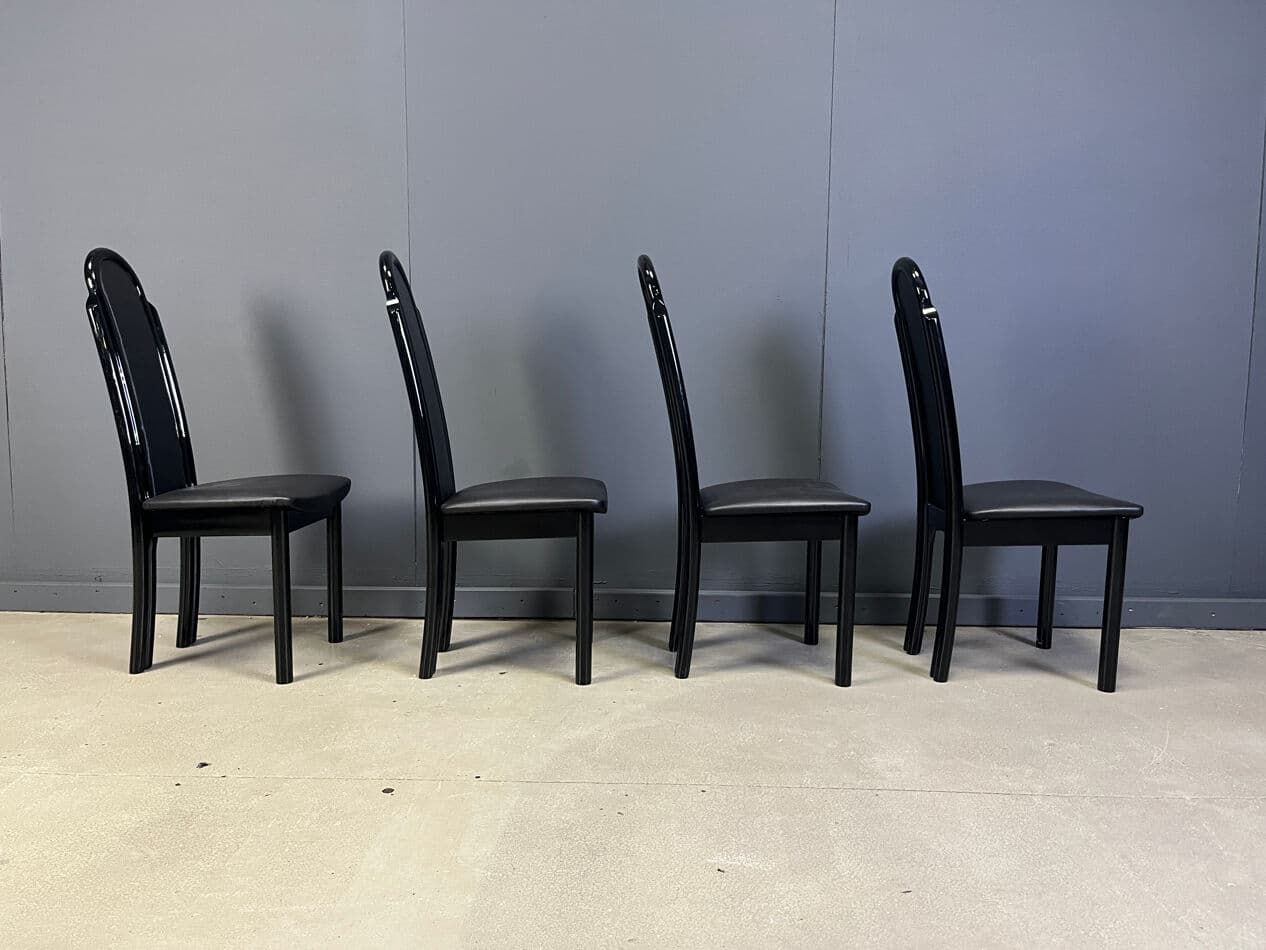 Set of four postmodern dining chairs, black wood, black faux leather, Italy, 1980s. - 330345