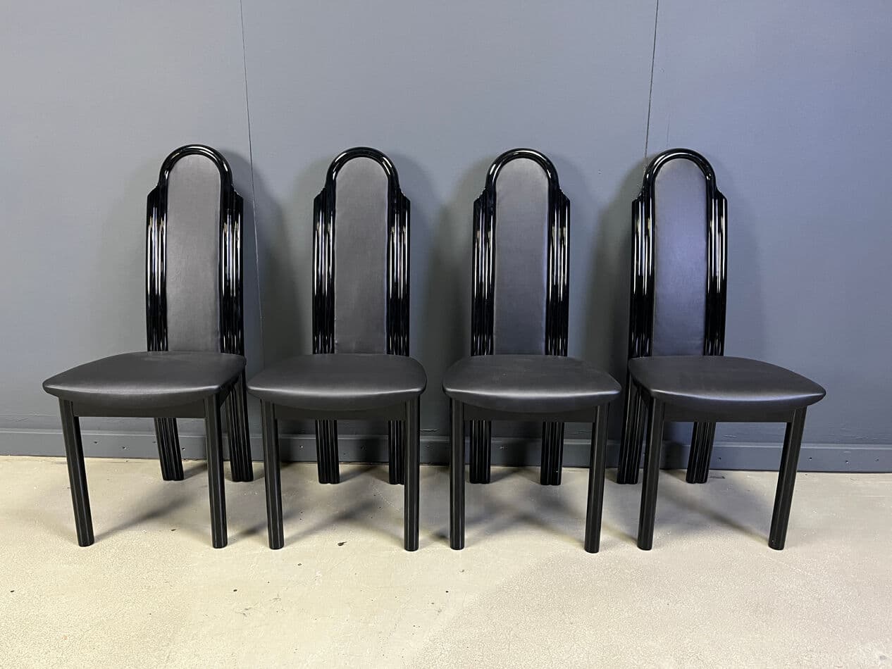 Set of four postmodern dining chairs, black wood, black faux leather, Italy, 1980s. - 330343