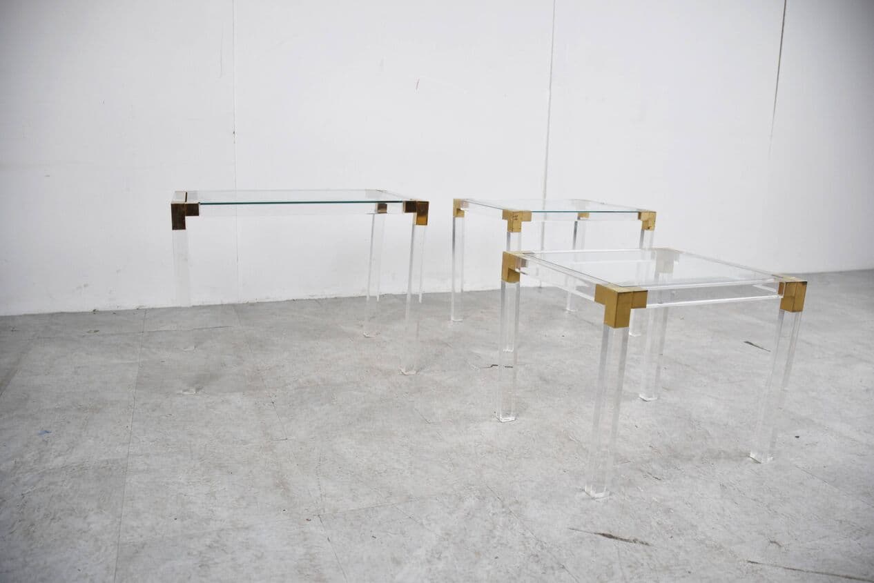 Set of three nesting tables, transparent lucite, brass, glass, Belgium, 1970s. - 329412