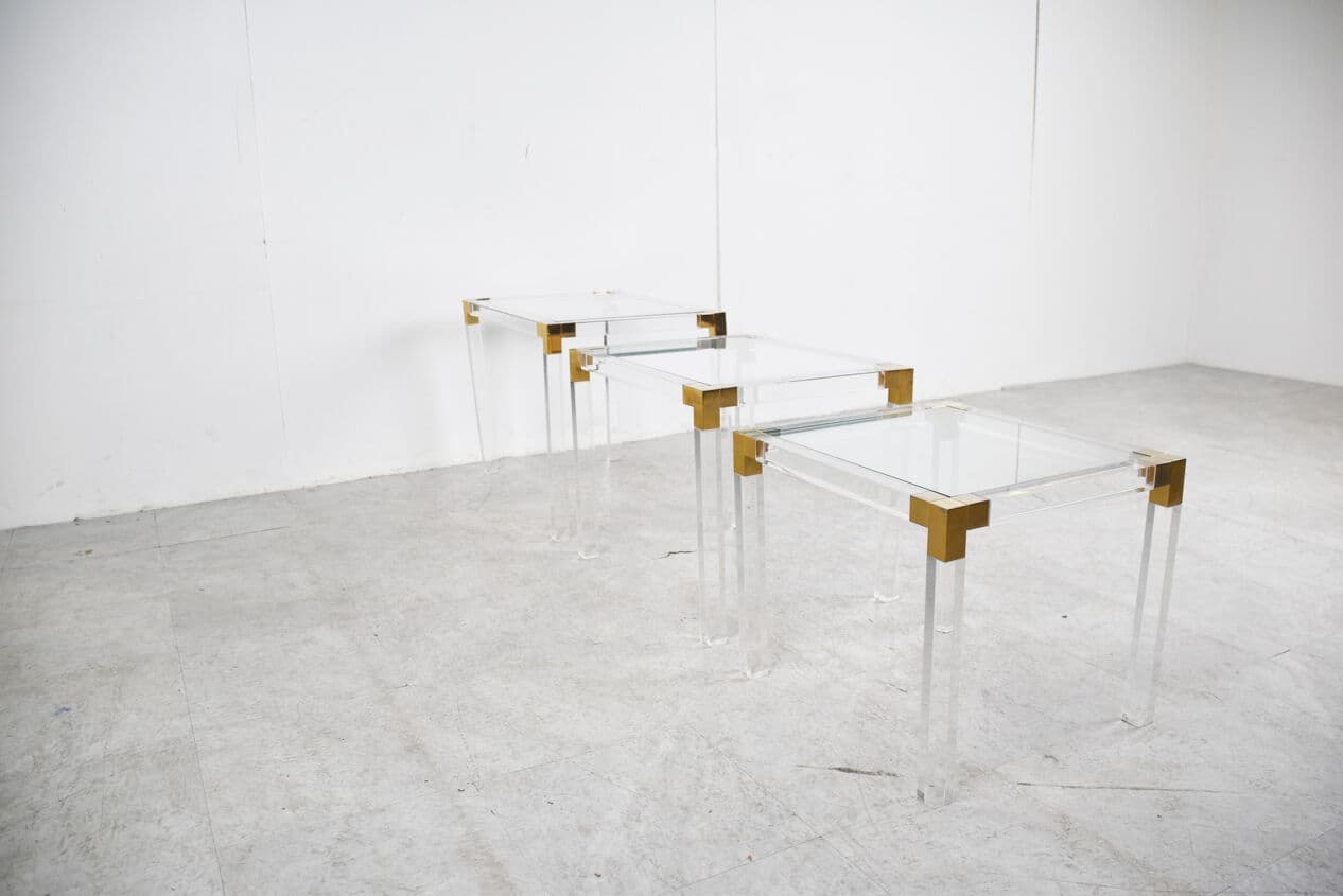 Set of three nesting tables, transparent lucite, brass, glass, Belgium, 1970s. - 329422