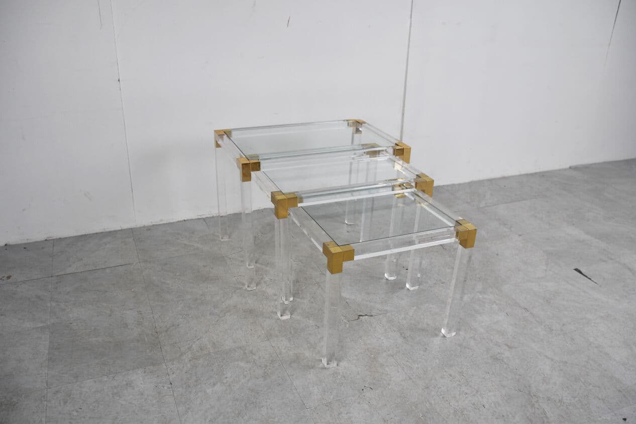 Set of three nesting tables, transparent lucite, brass, glass, Belgium, 1970s. - 329416