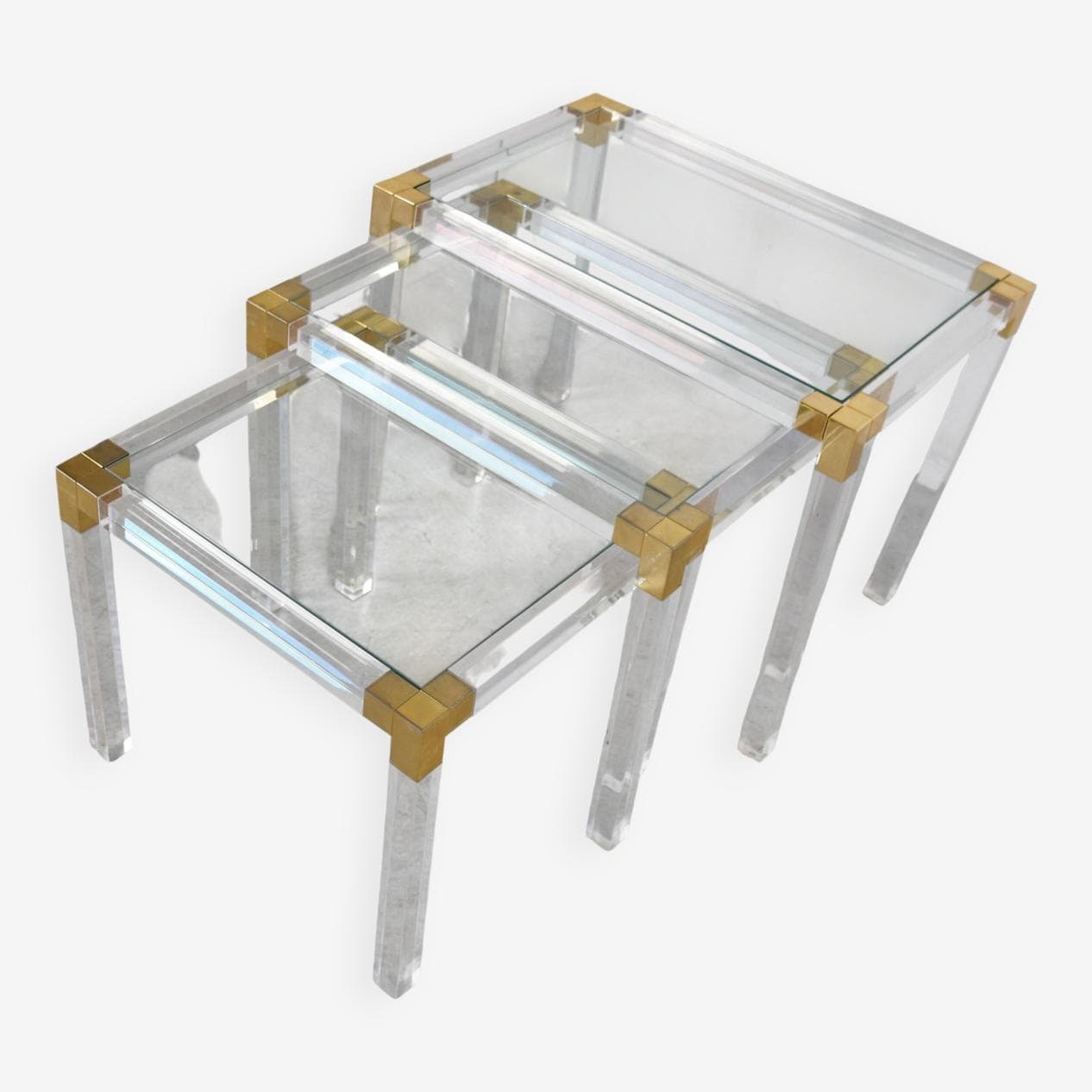 Set of three nesting tables, transparent lucite, brass, glass, Belgium, 1970s. - 329414