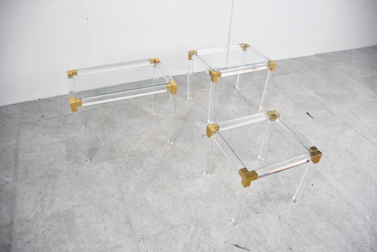 Set of three nesting tables, transparent lucite, brass, glass, Belgium, 1970s. - 329420