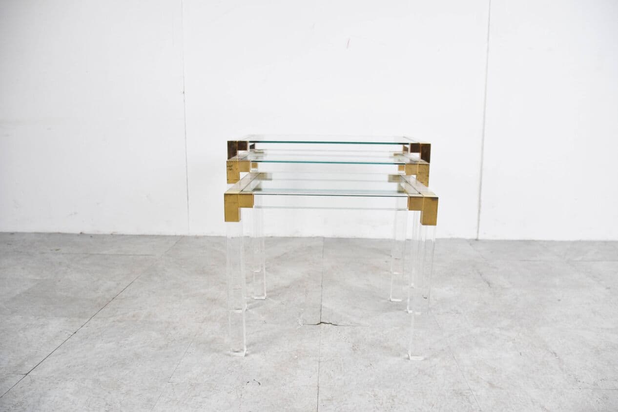 Set of three nesting tables, transparent lucite, brass, glass, Belgium, 1970s. - 329418
