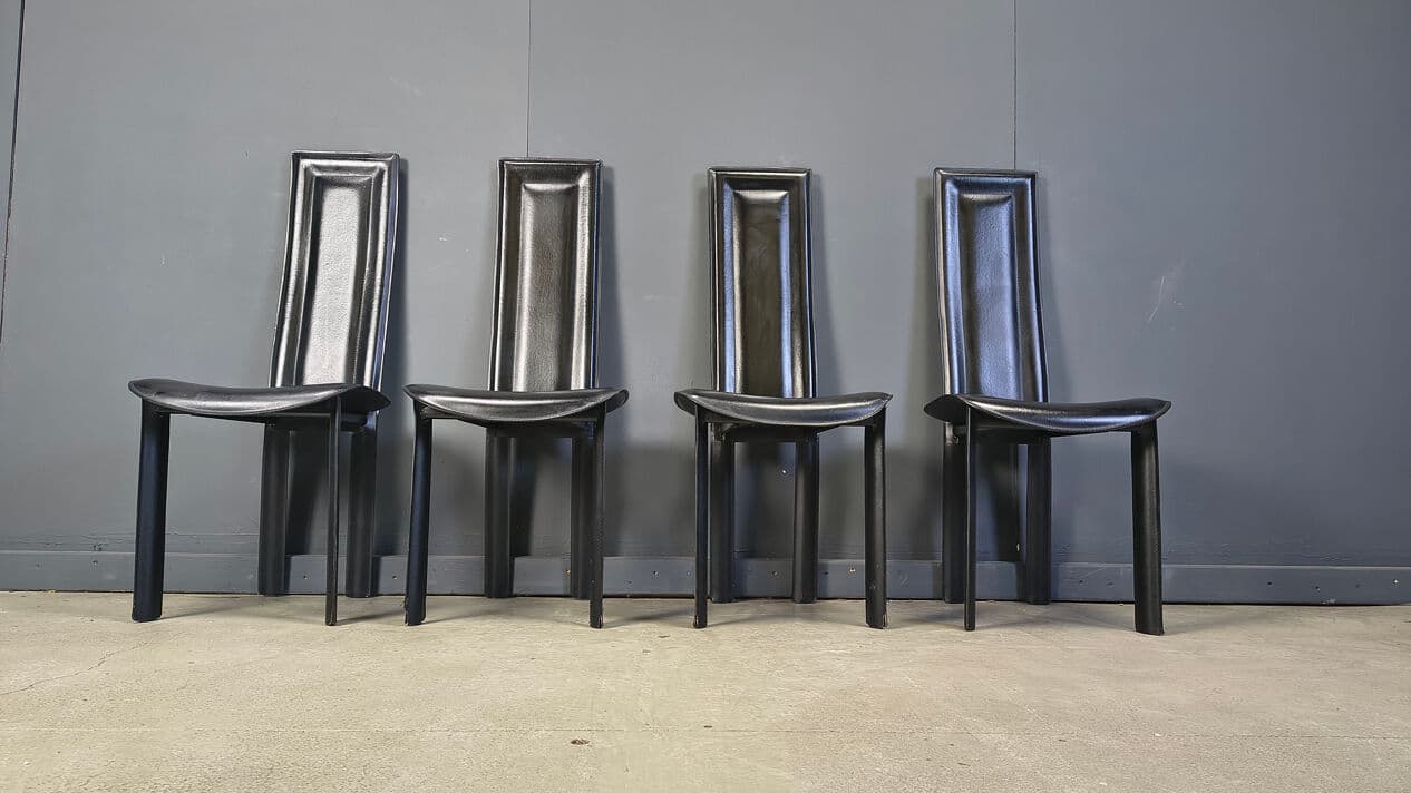 Set of four dining chairs, black leather, Italy, 1980s. - 328845