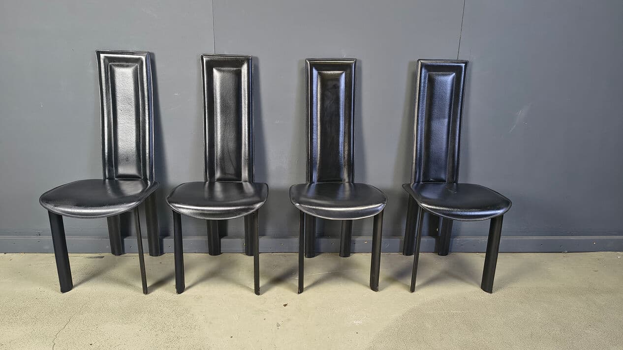 Set of four dining chairs, black leather, Italy, 1980s. - 328843
