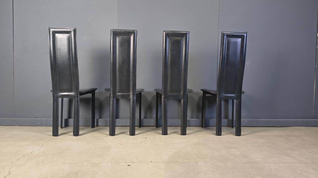 Set of four dining chairs, black leather, Italy, 1980s. - 328850