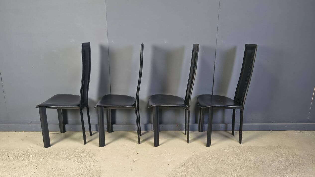 Set of four dining chairs, black leather, Italy, 1980s. - 328849