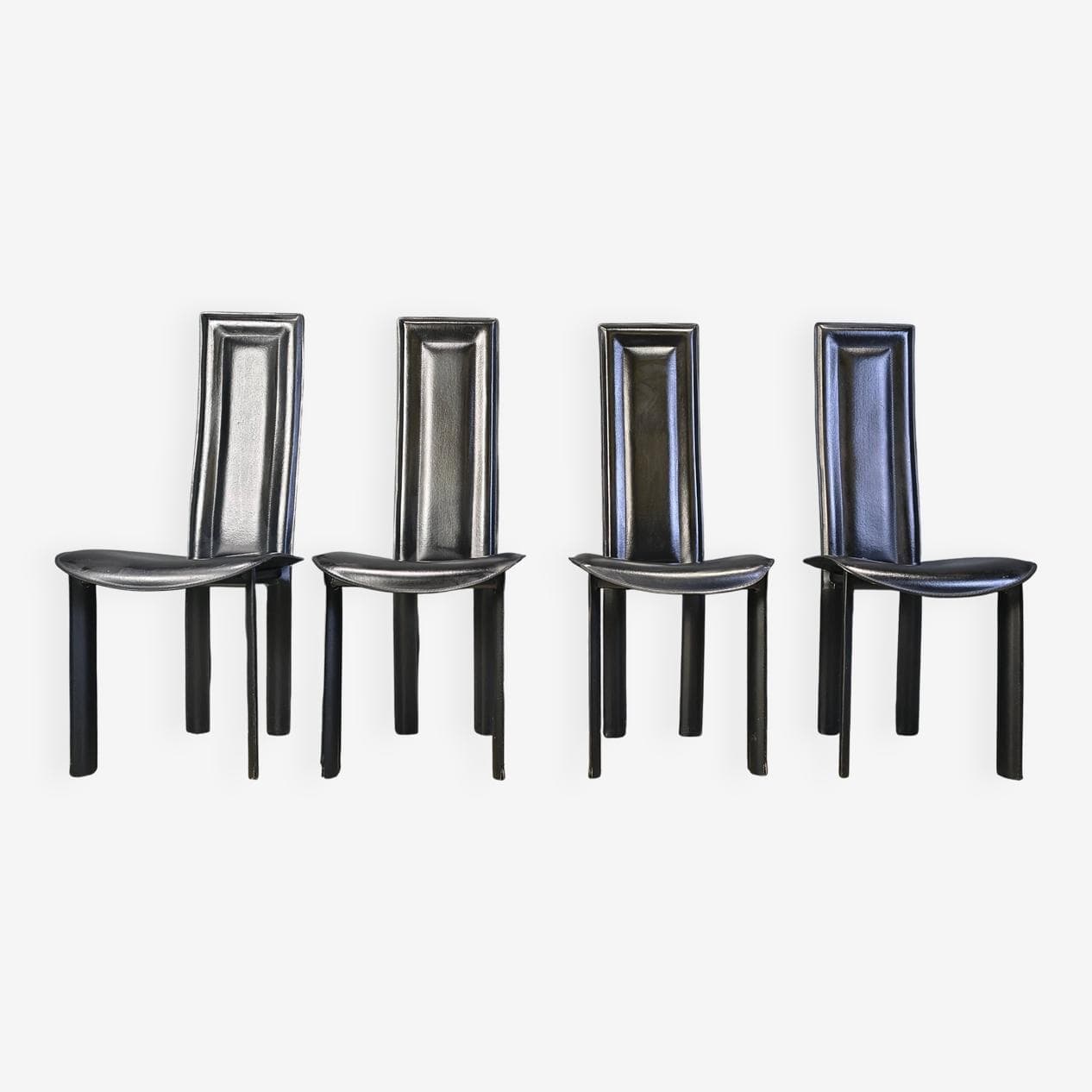 Set of four dining chairs, black leather, Italy, 1980s. - 328842