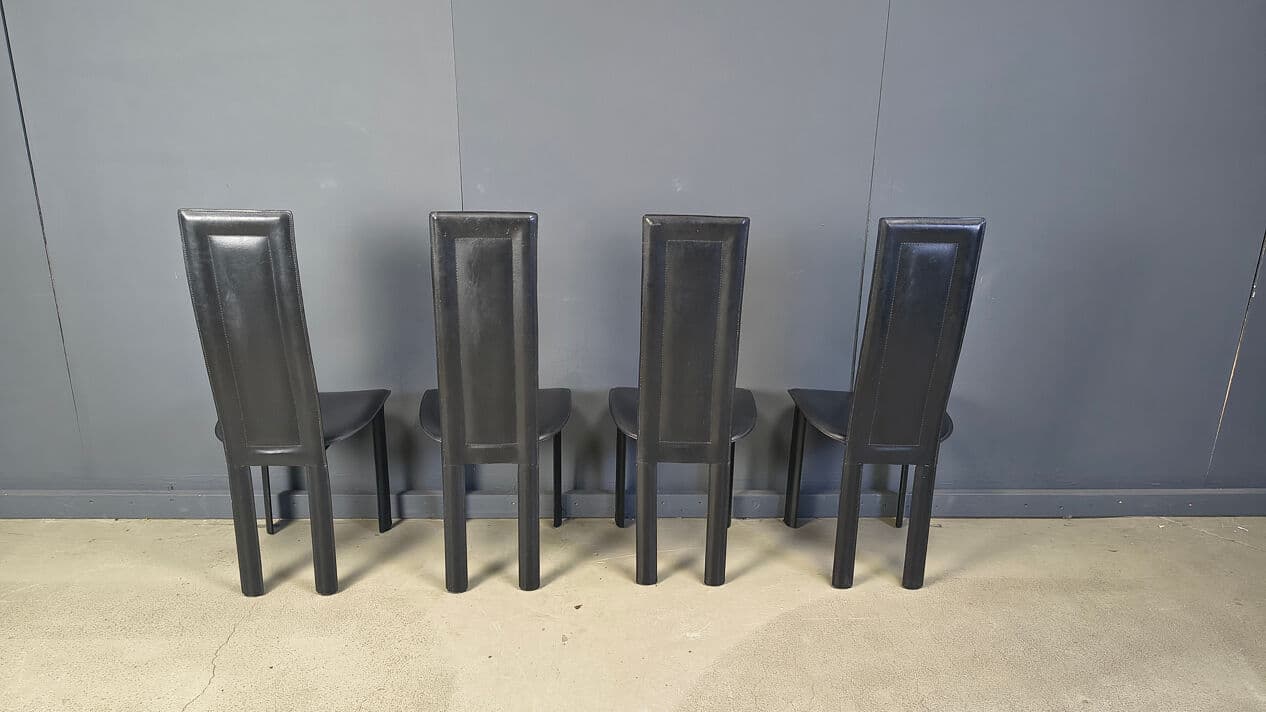 Set of four dining chairs, black leather, Italy, 1980s. - 328848