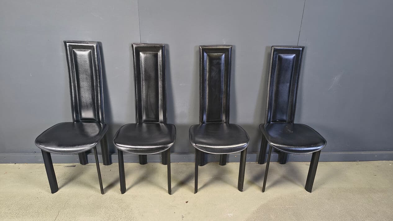 Set of four dining chairs, black leather, Italy, 1980s. - 328840