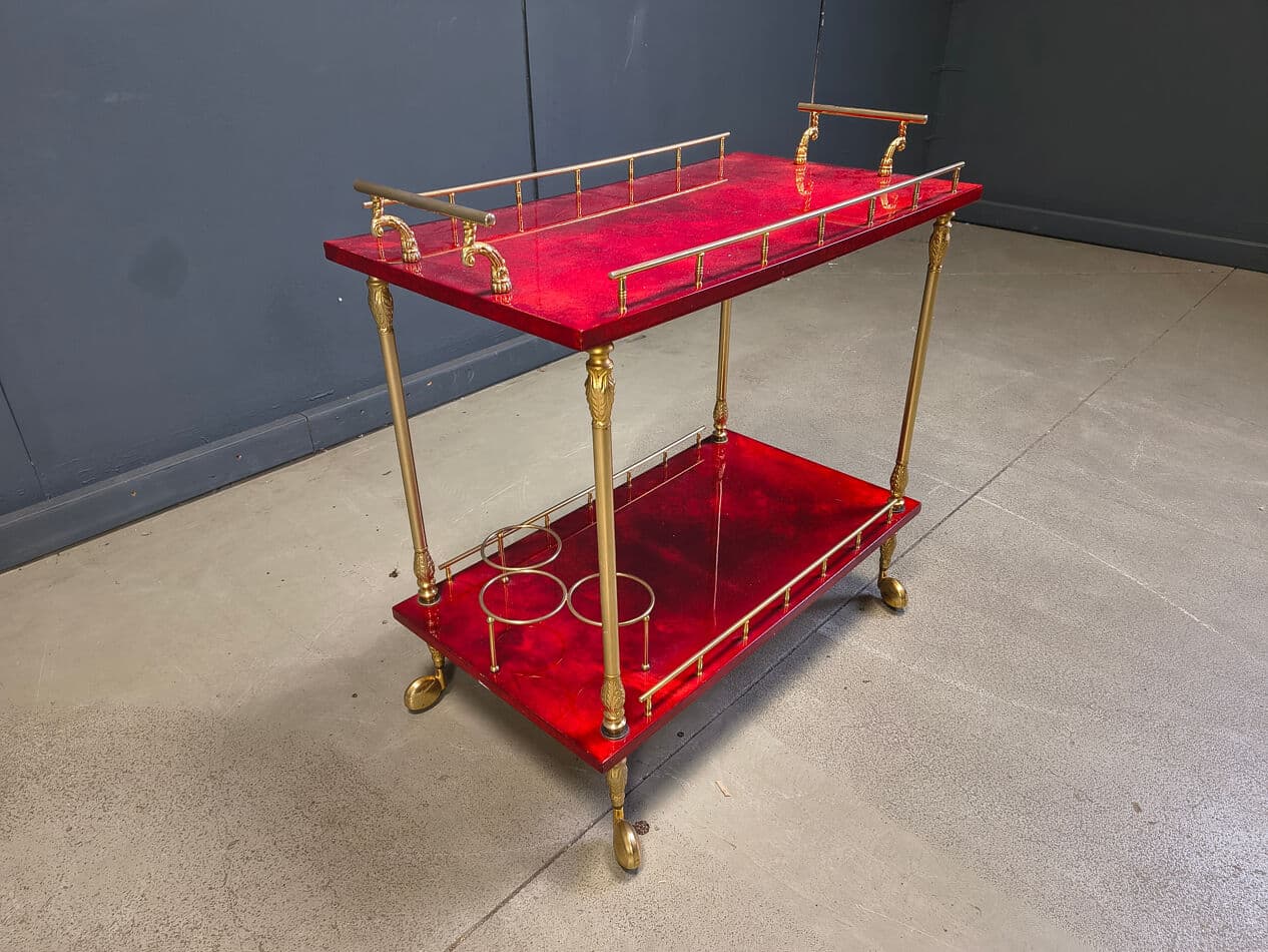 Bar cart, burgundy lacquered goatskin, gold metal, by A. Tura, Italy, 1970s. - 328778