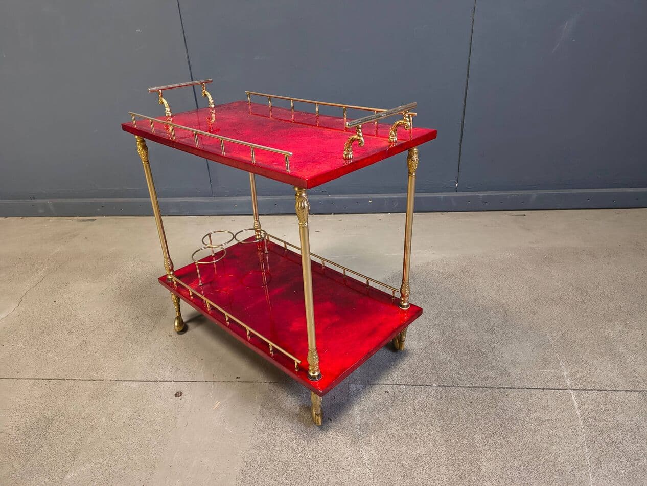 Bar cart, burgundy lacquered goatskin, gold metal, by A. Tura, Italy, 1970s. - 328781