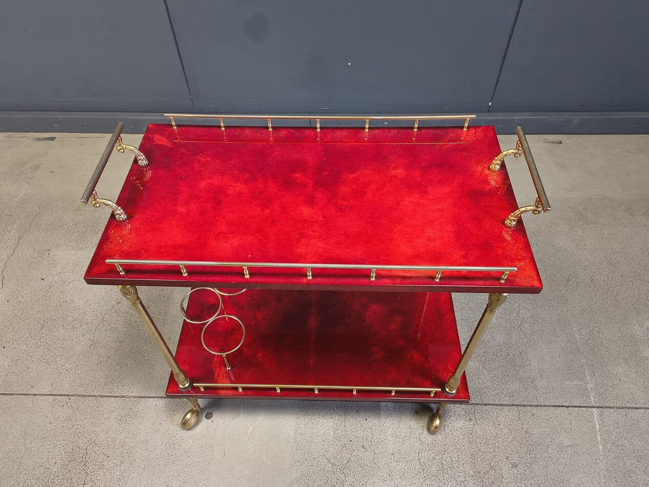 Bar cart, burgundy lacquered goatskin, gold metal, by A. Tura, Italy, 1970s. - 328772