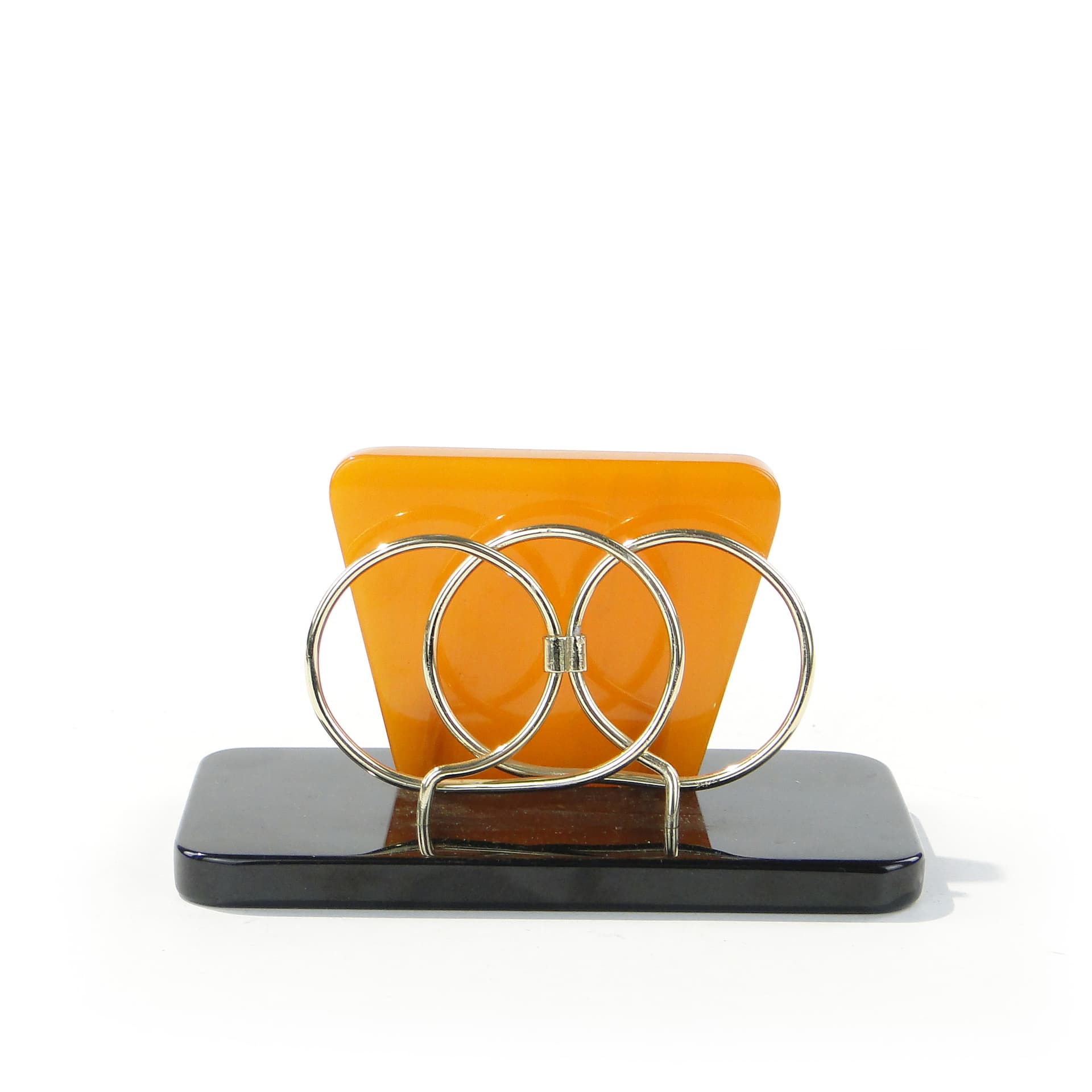 Napkin Holder, black and orange Bakelite, gold brass, Switzerland, 1960s. - 332847