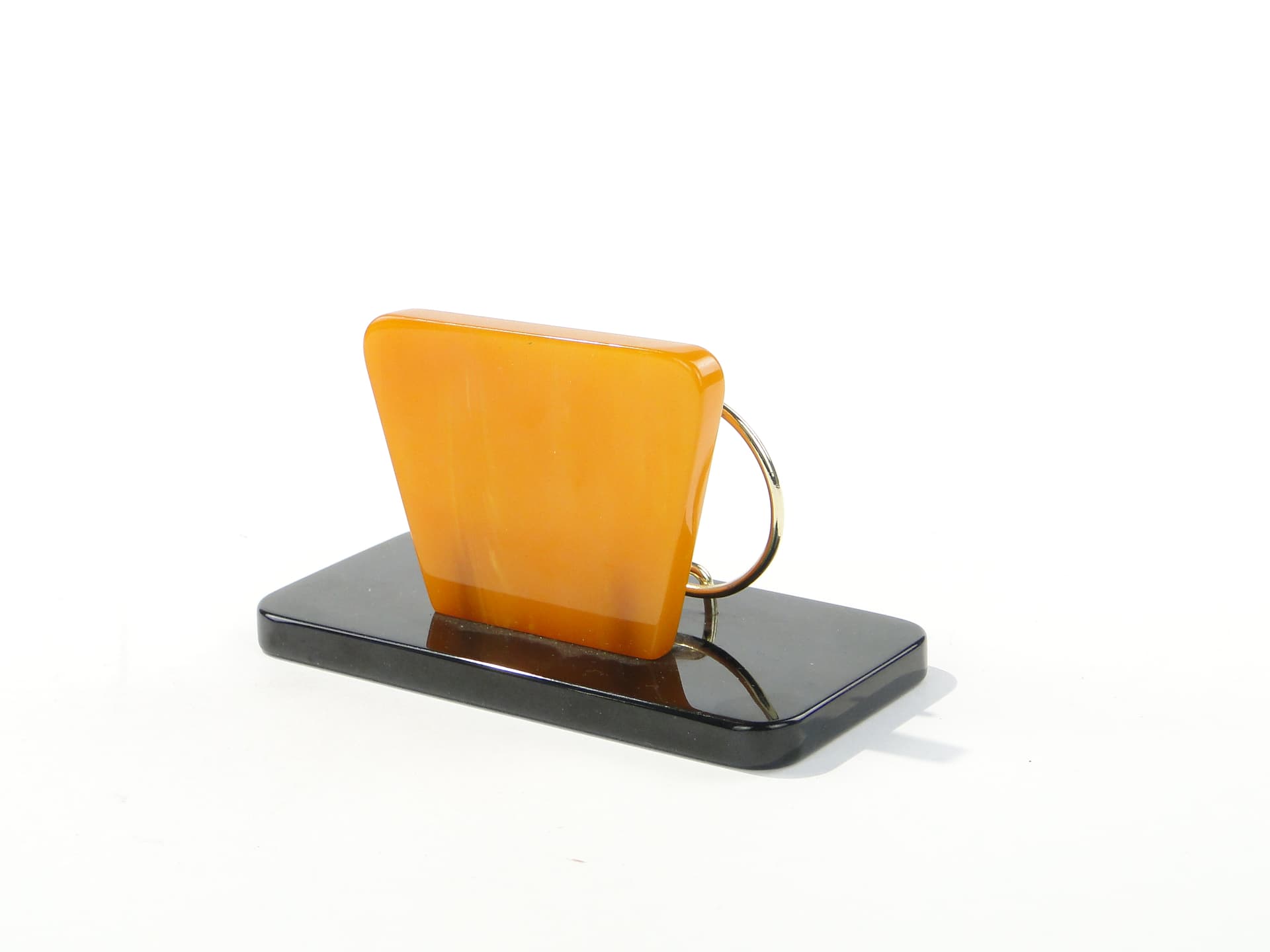 Napkin Holder, black and orange Bakelite, gold brass, Switzerland, 1960s. - 332846