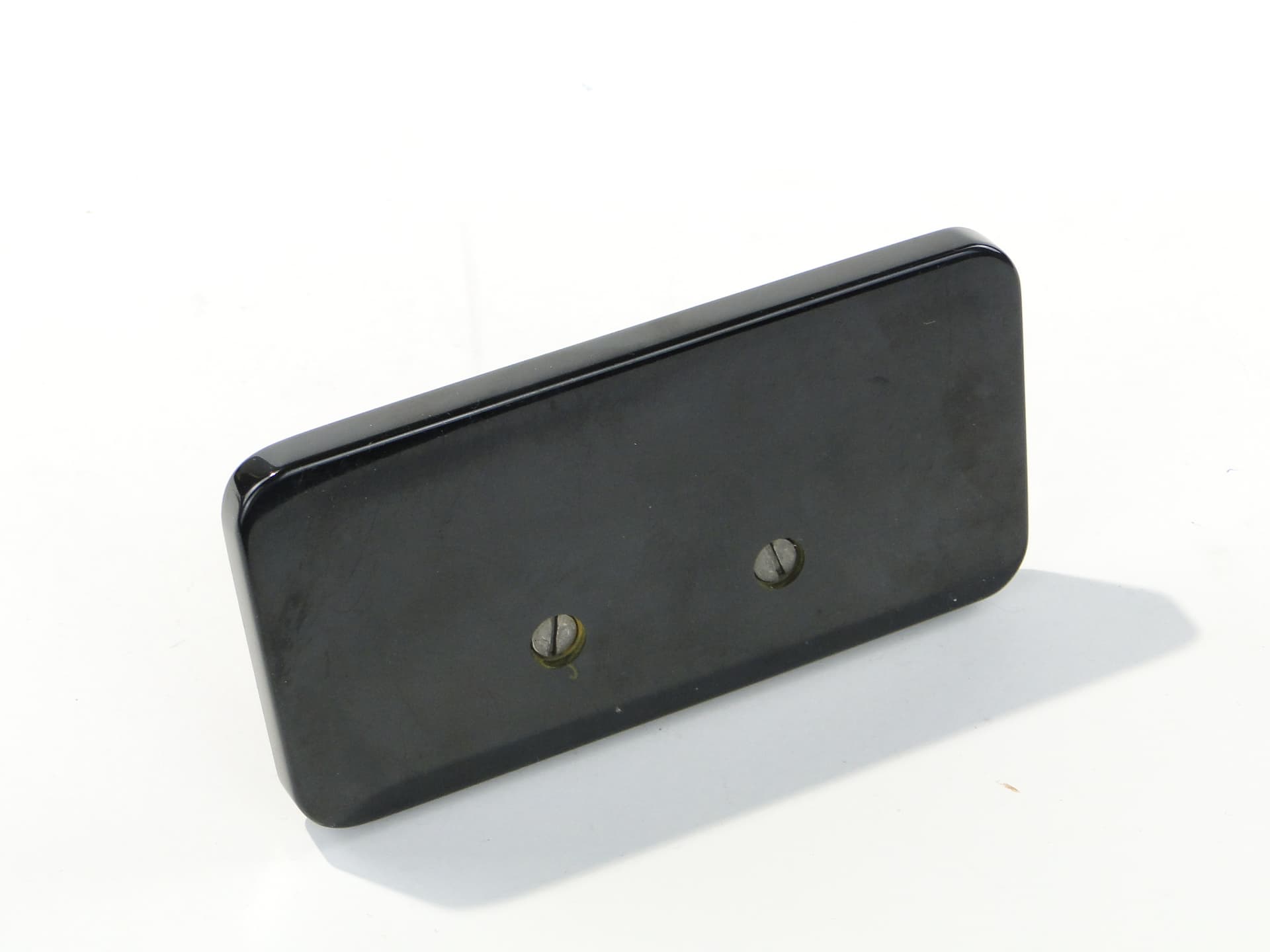 Napkin Holder, black and orange Bakelite, gold brass, Switzerland, 1960s. - 332848