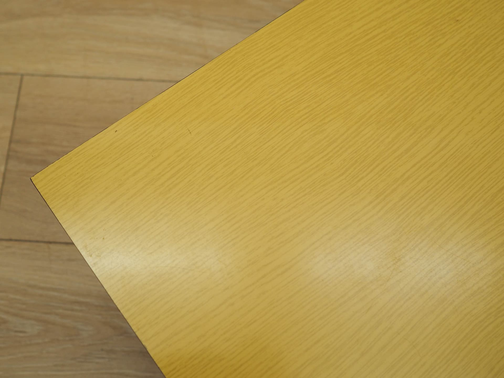 Lowboard, yellow laminate, black metal, Denmark, 1980s. - 333068