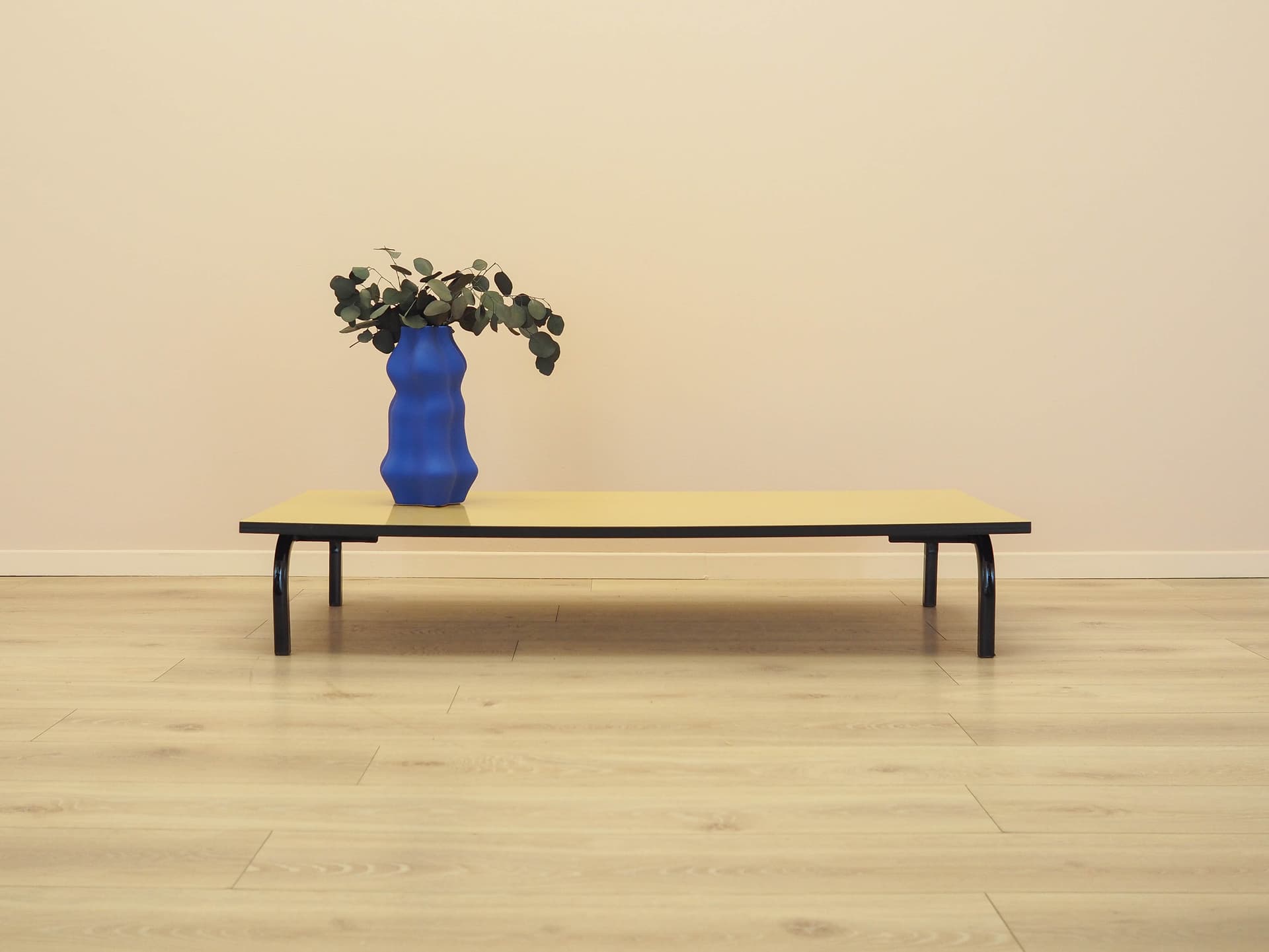 Lowboard, yellow laminate, black metal, Denmark, 1980s. - 333057